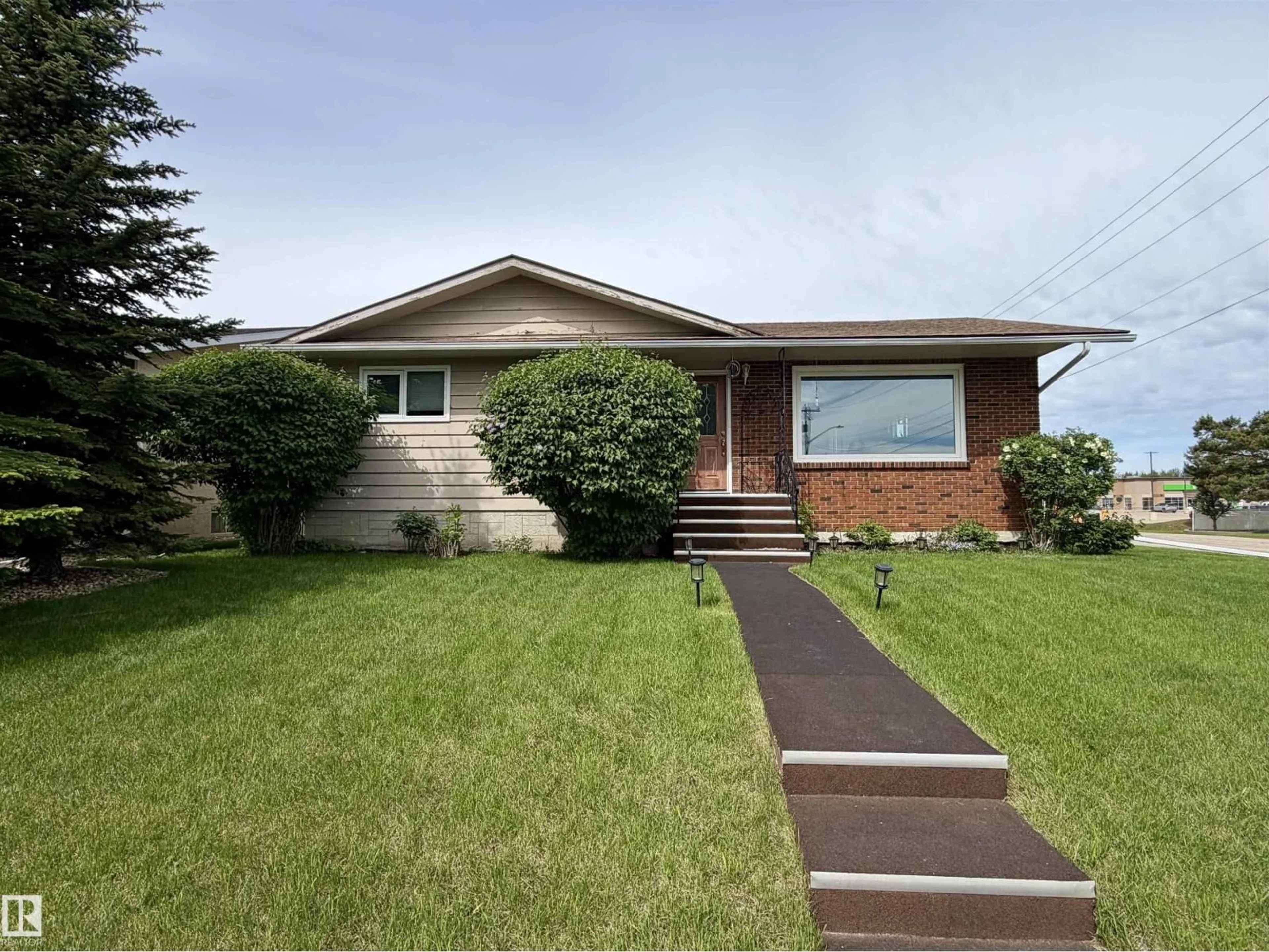 Home with vinyl exterior material, street for 5428 49A ST, Drayton Valley Alberta T7A1A3