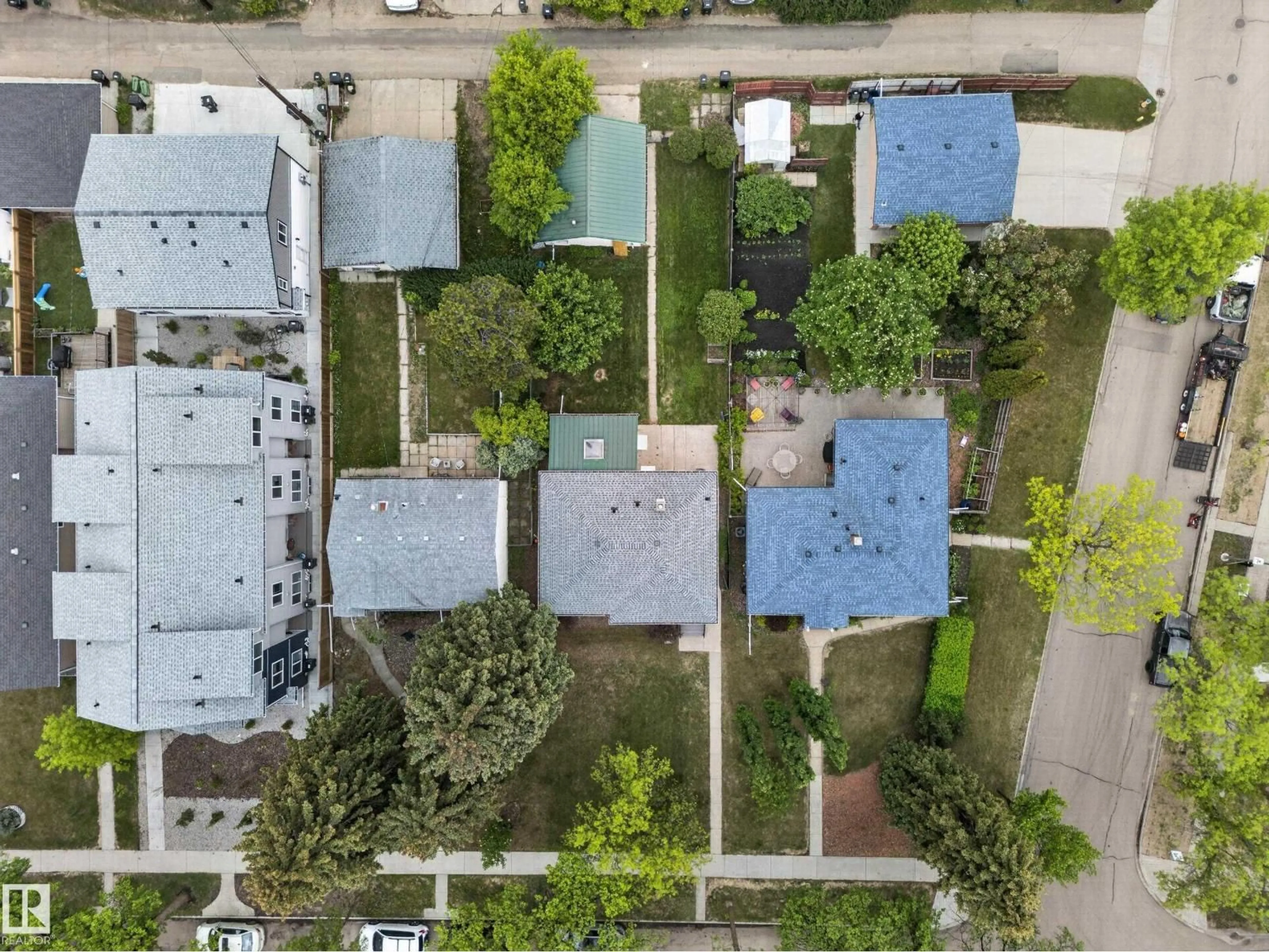 A pic from outside/outdoor area/front of a property/back of a property/a pic from drone, street for 8706 83 AV, Edmonton Alberta T6C1B3