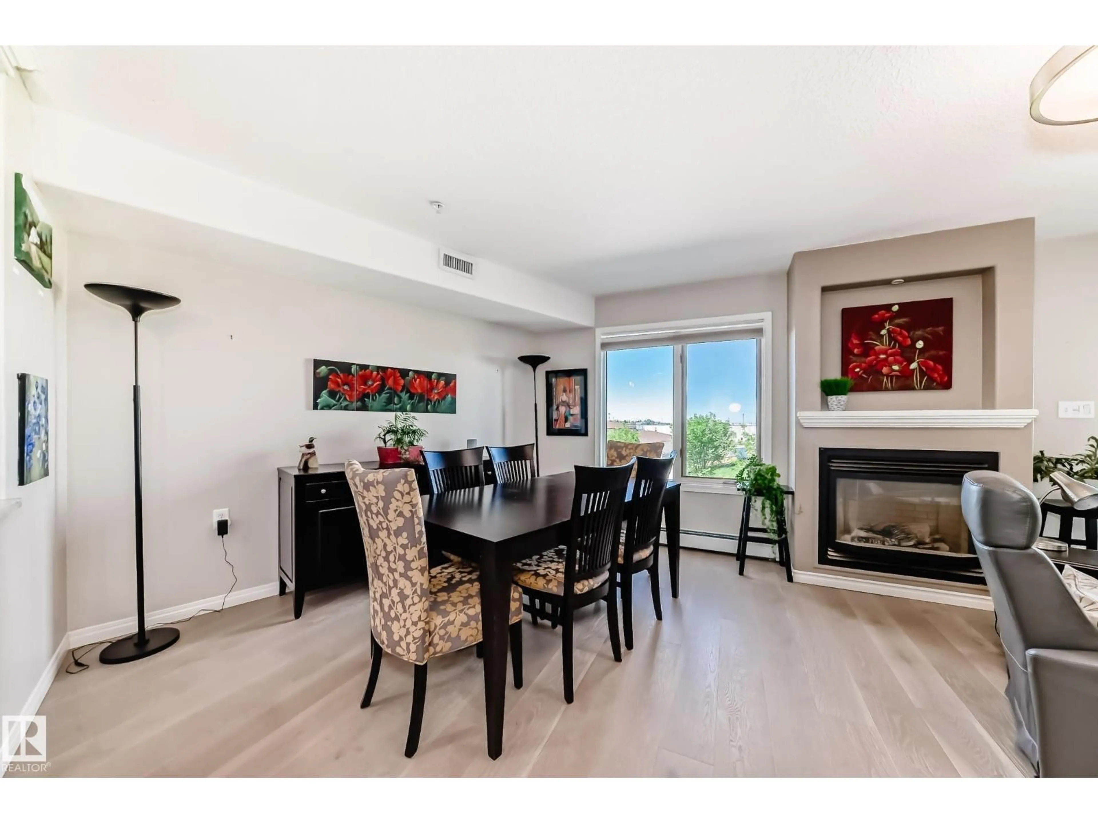 Dining room, wood/laminate floor for #324 - 200 BETHEL DR, Sherwood Park Alberta T8H2C5