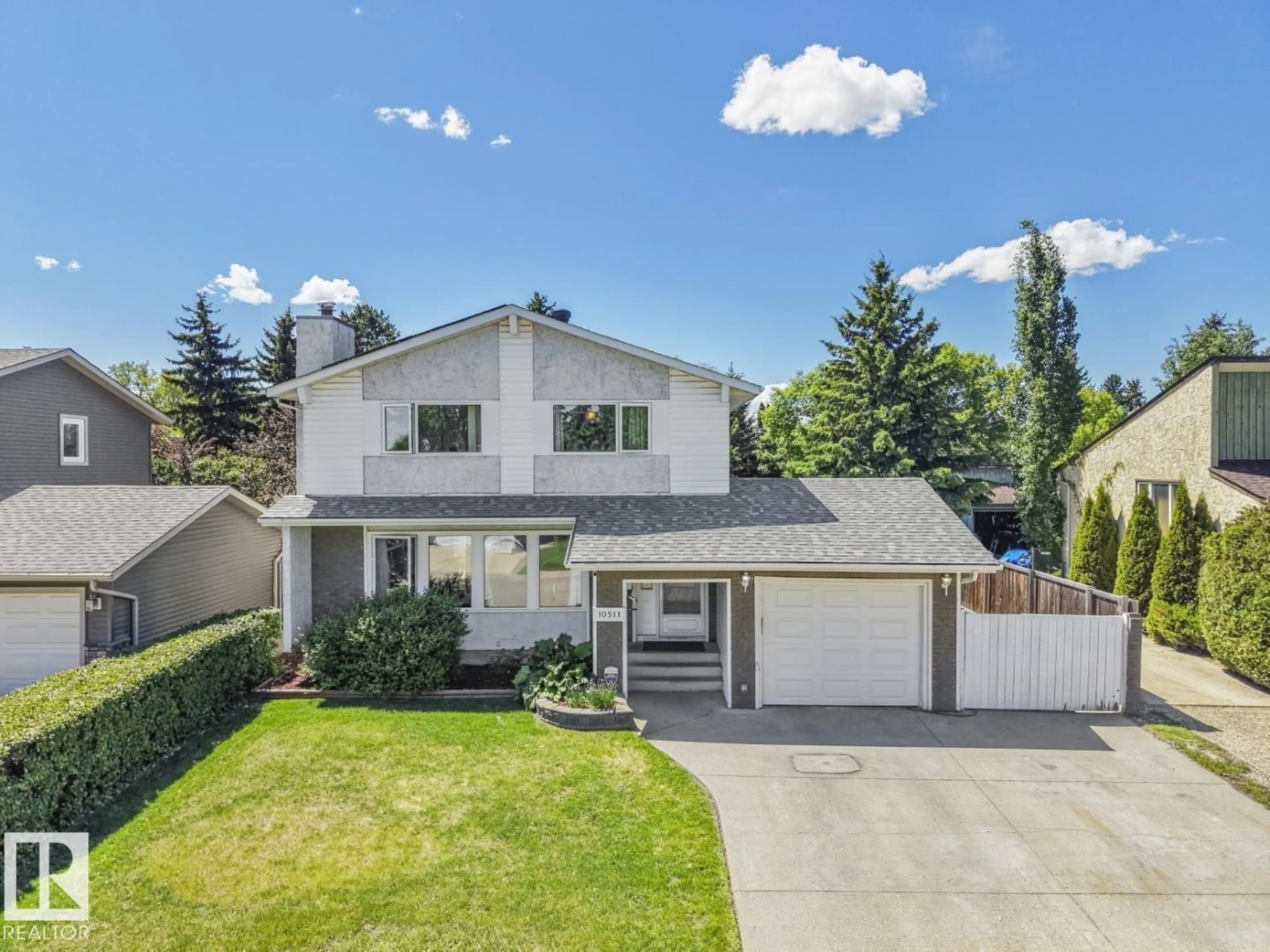 A pic from outside/outdoor area/front of a property/back of a property/a pic from drone, street for 10511 26 AV, Edmonton Alberta T6J4C1