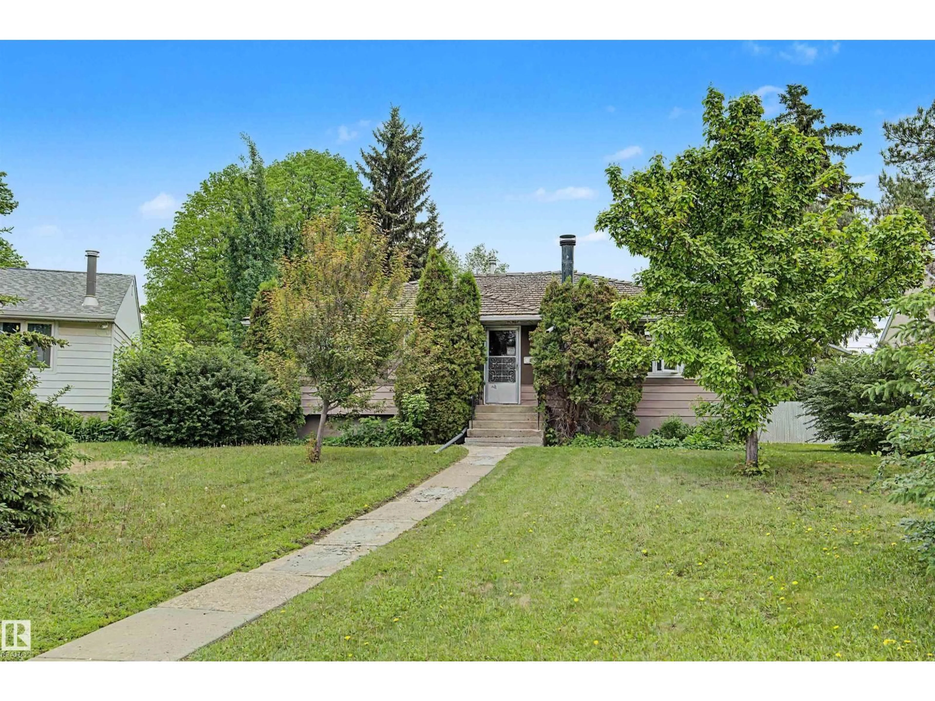 A pic from outside/outdoor area/front of a property/back of a property/a pic from drone, street for NW - 10647 147 ST, Edmonton Alberta T5N3C6