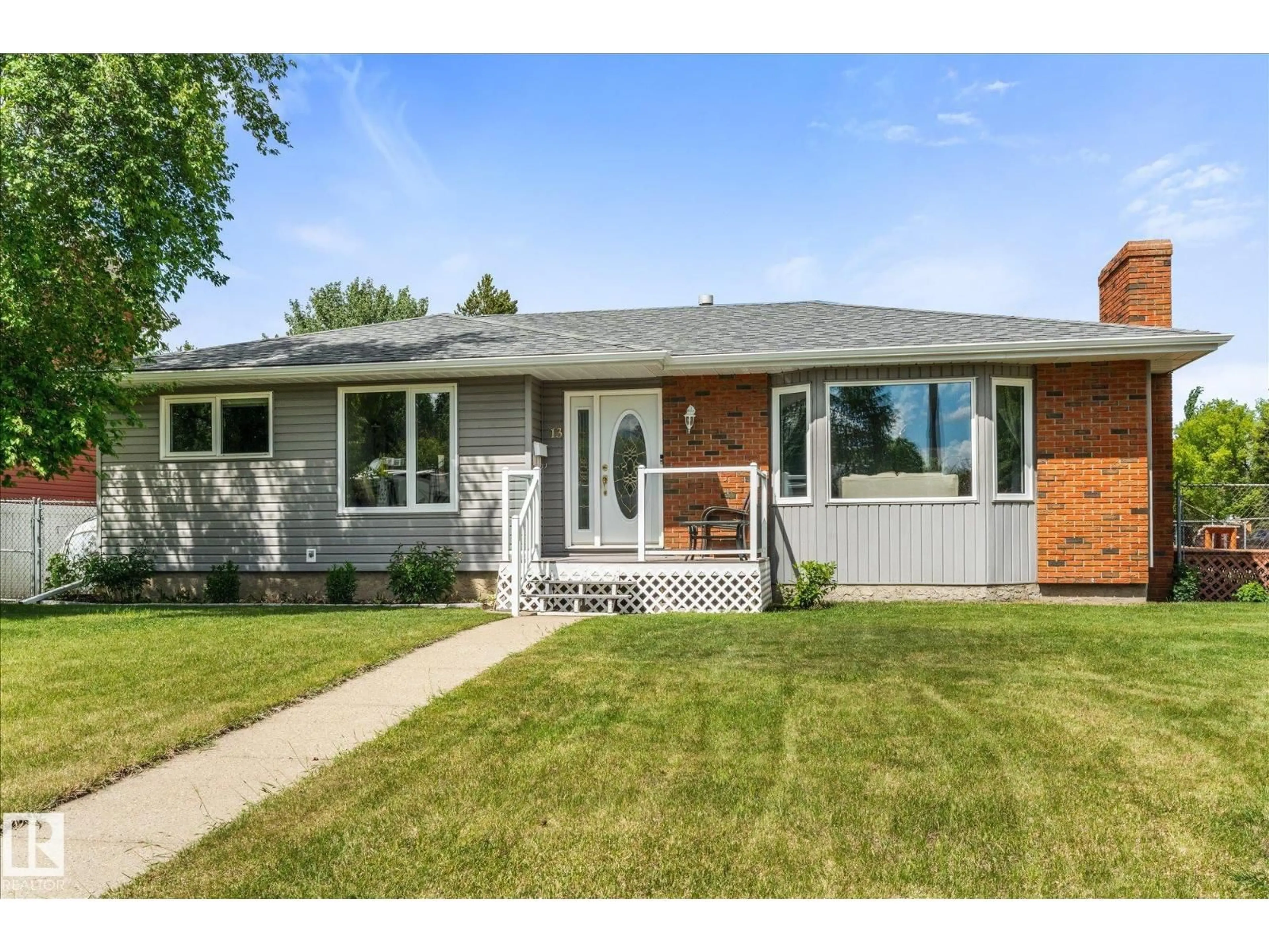 Home with vinyl exterior material, street for 13 OATWAY DR, Stony Plain Alberta T7Z1G4