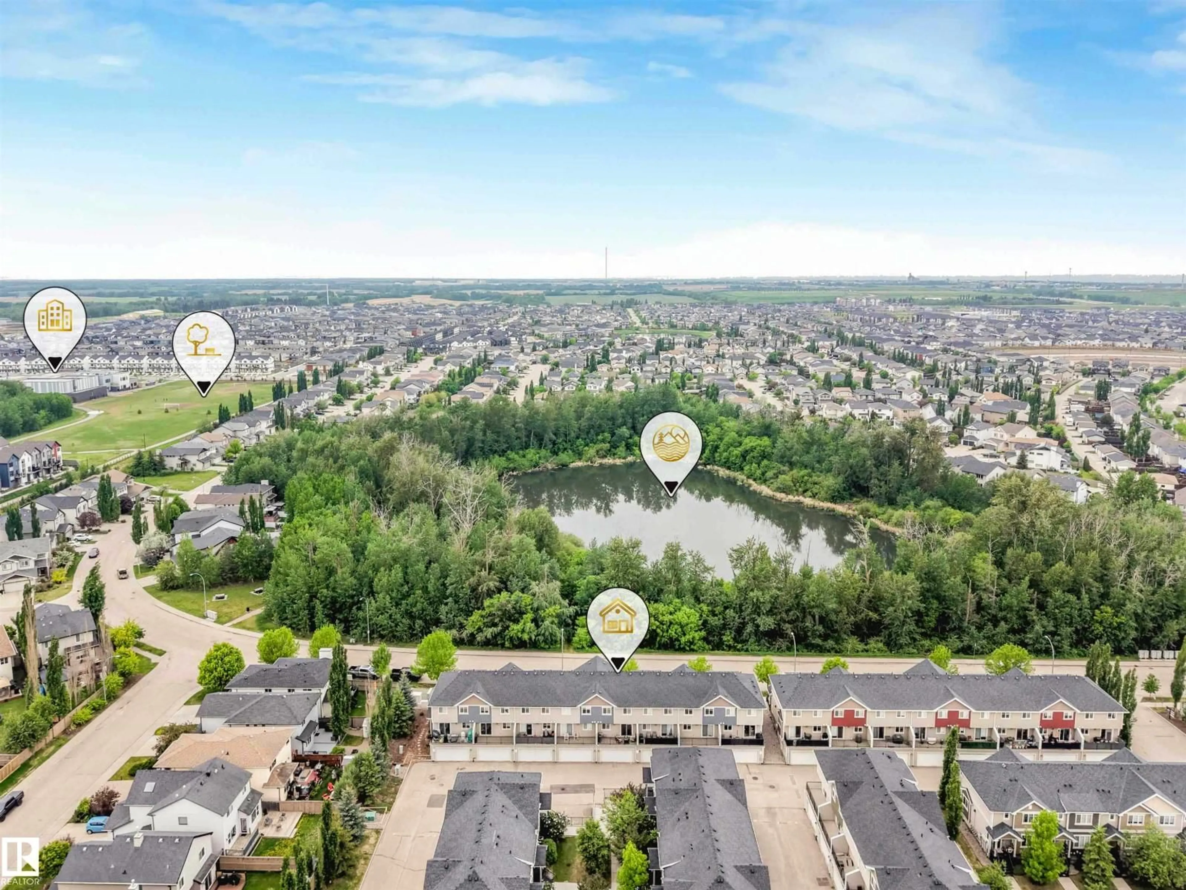 A pic from outside/outdoor area/front of a property/back of a property/a pic from drone, water/lake/river/ocean view for #12 - 9535 217 ST, Edmonton Alberta T5T4P5
