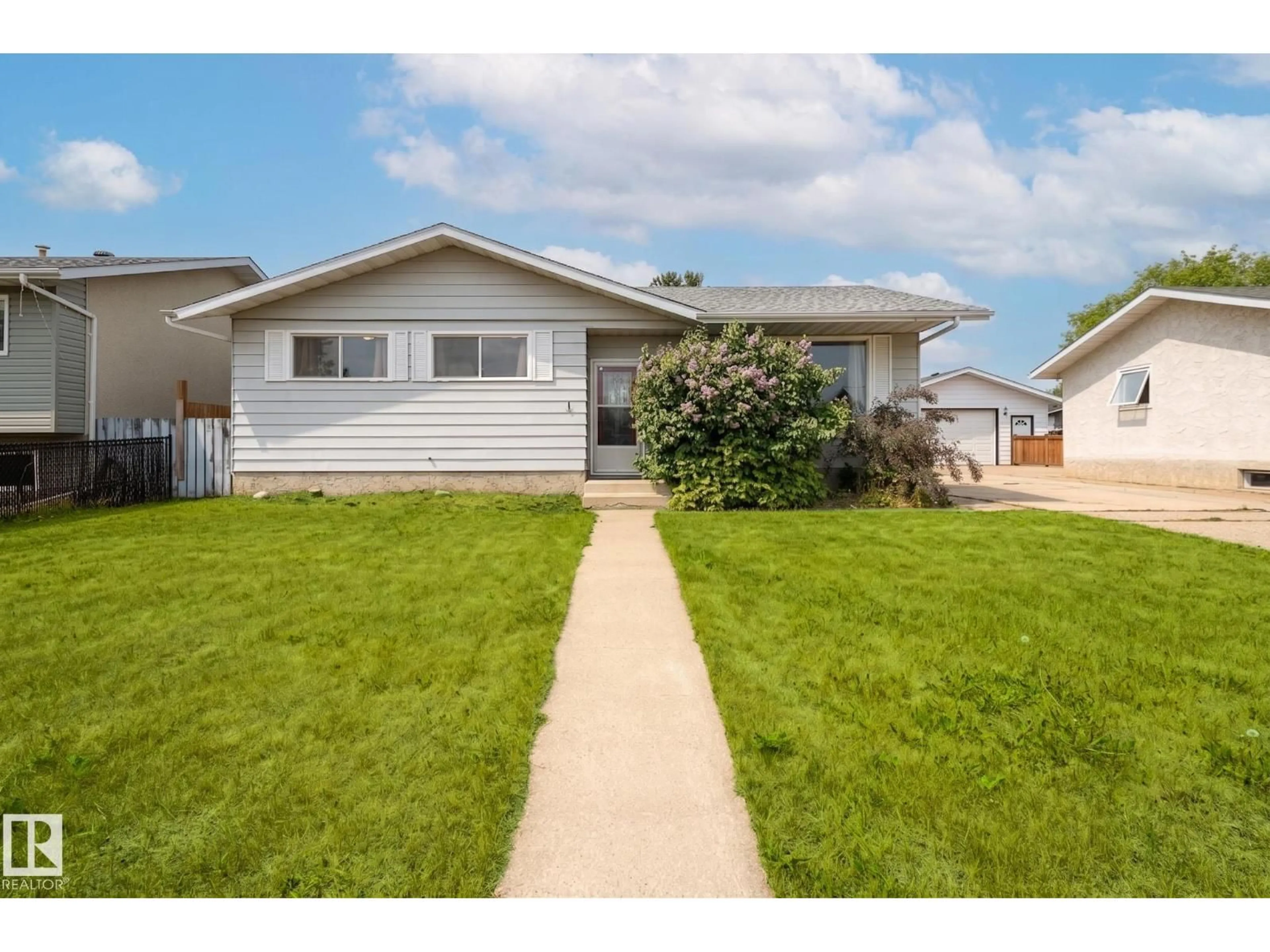 Home with vinyl exterior material, street for 9804 97 ST, Morinville Alberta T8R1G7