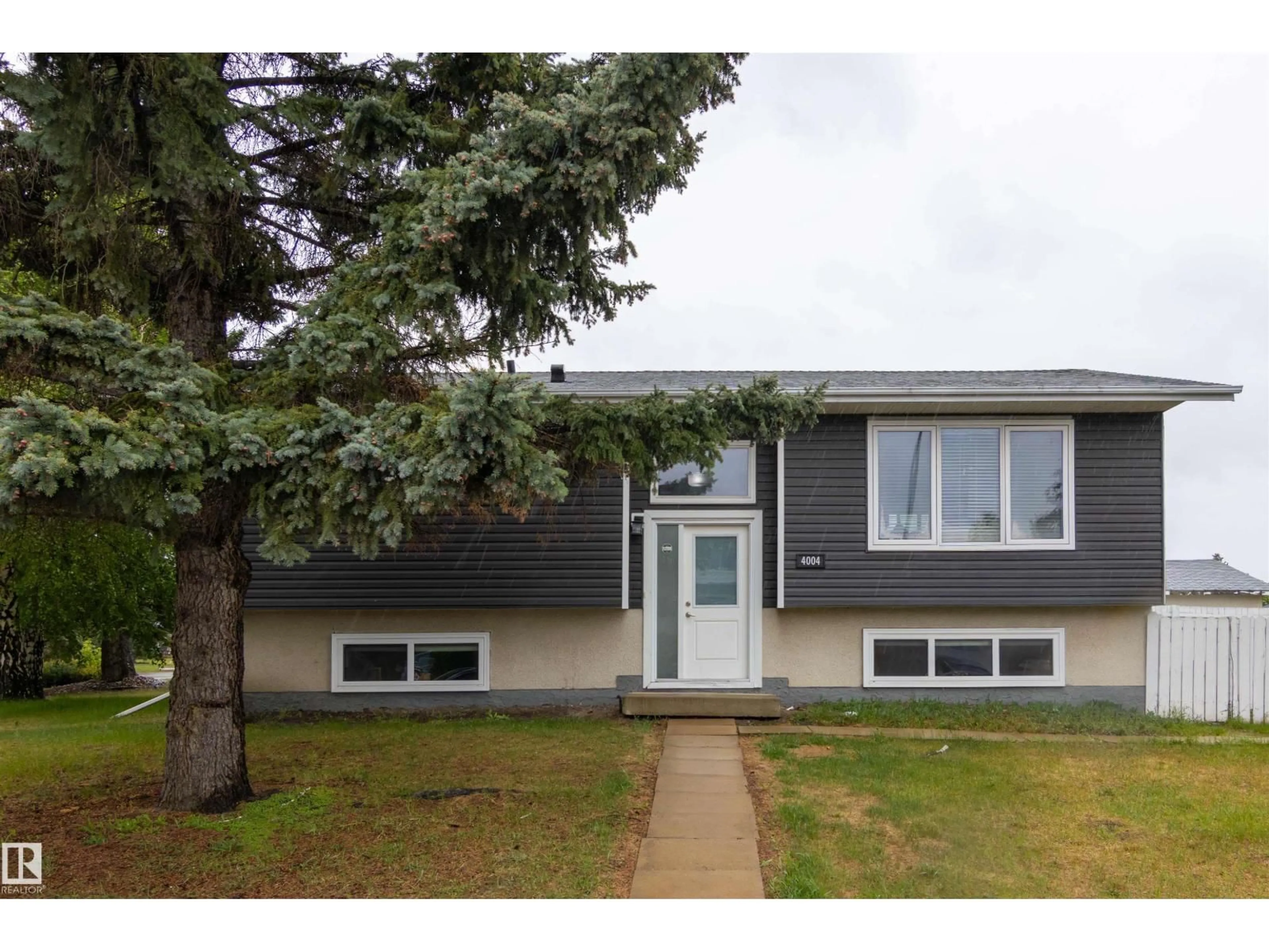 Home with vinyl exterior material, street for NW - 4004 88 ST, Edmonton Alberta T6K1T7