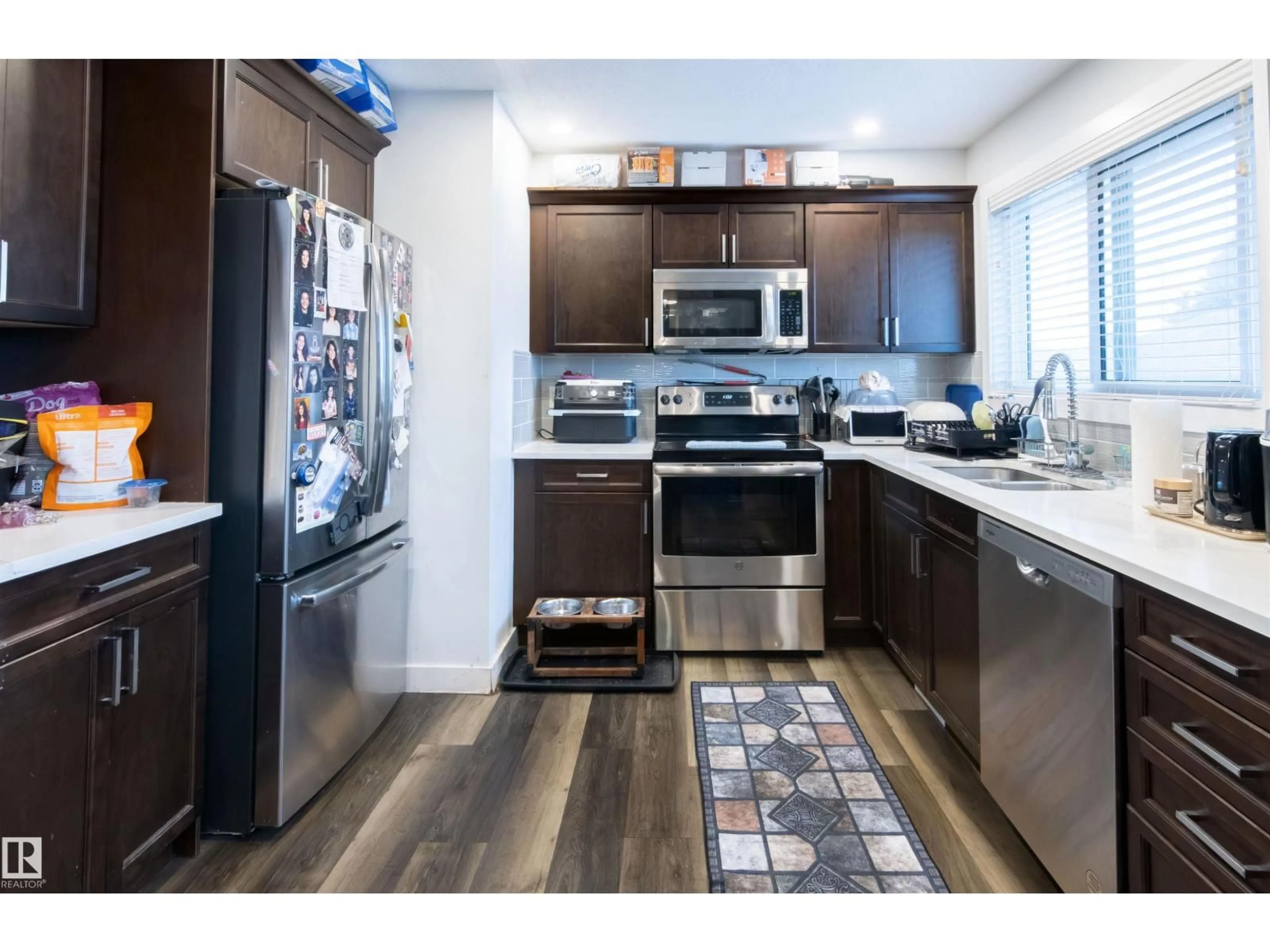 Open concept kitchen, unknown for NW - 4004 88 ST, Edmonton Alberta T6K1T7