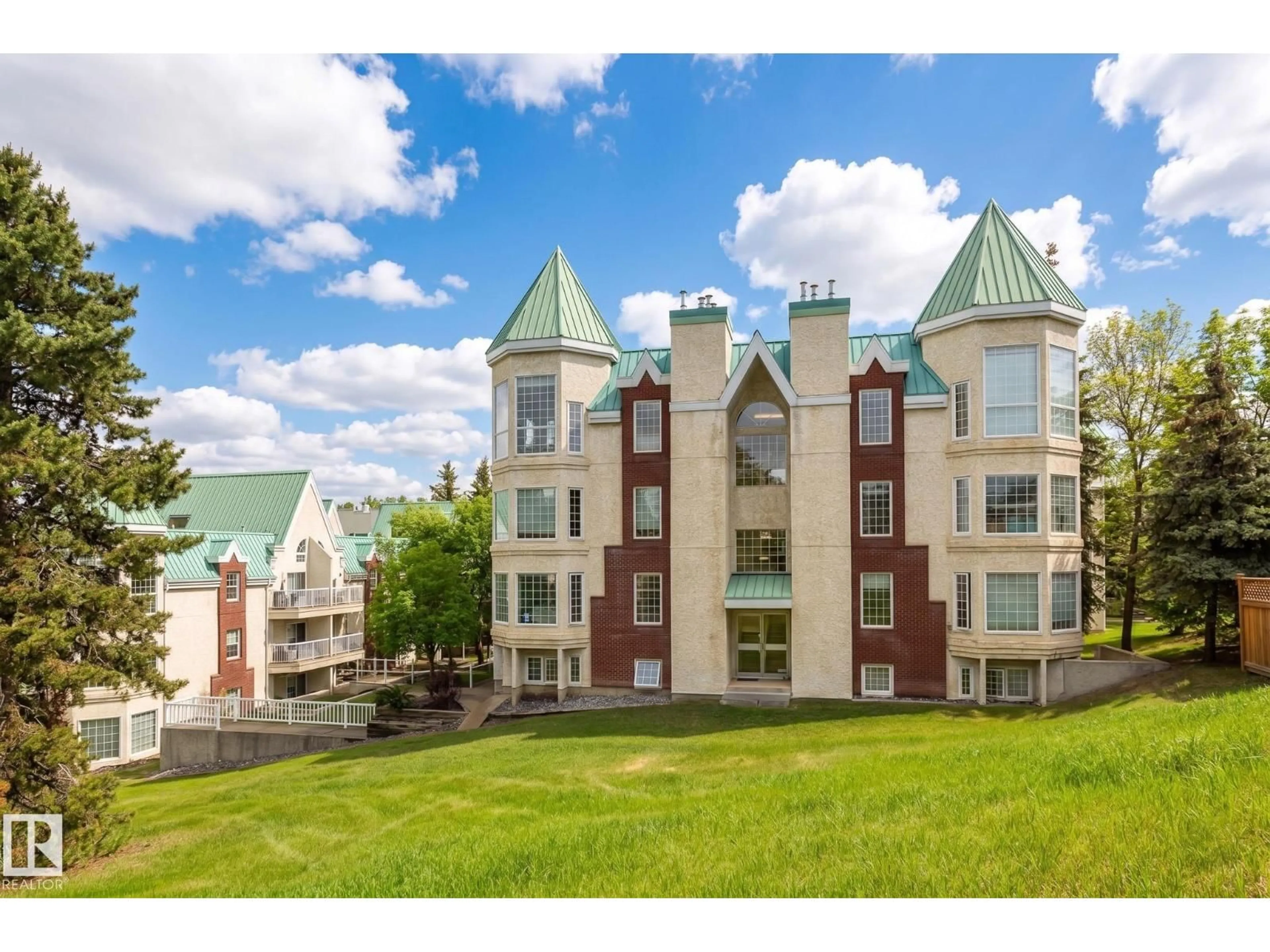 A pic from outside/outdoor area/front of a property/back of a property/a pic from drone, mountain view for 3 - 414 PERRON ST, St. Albert Alberta T8N5Z5