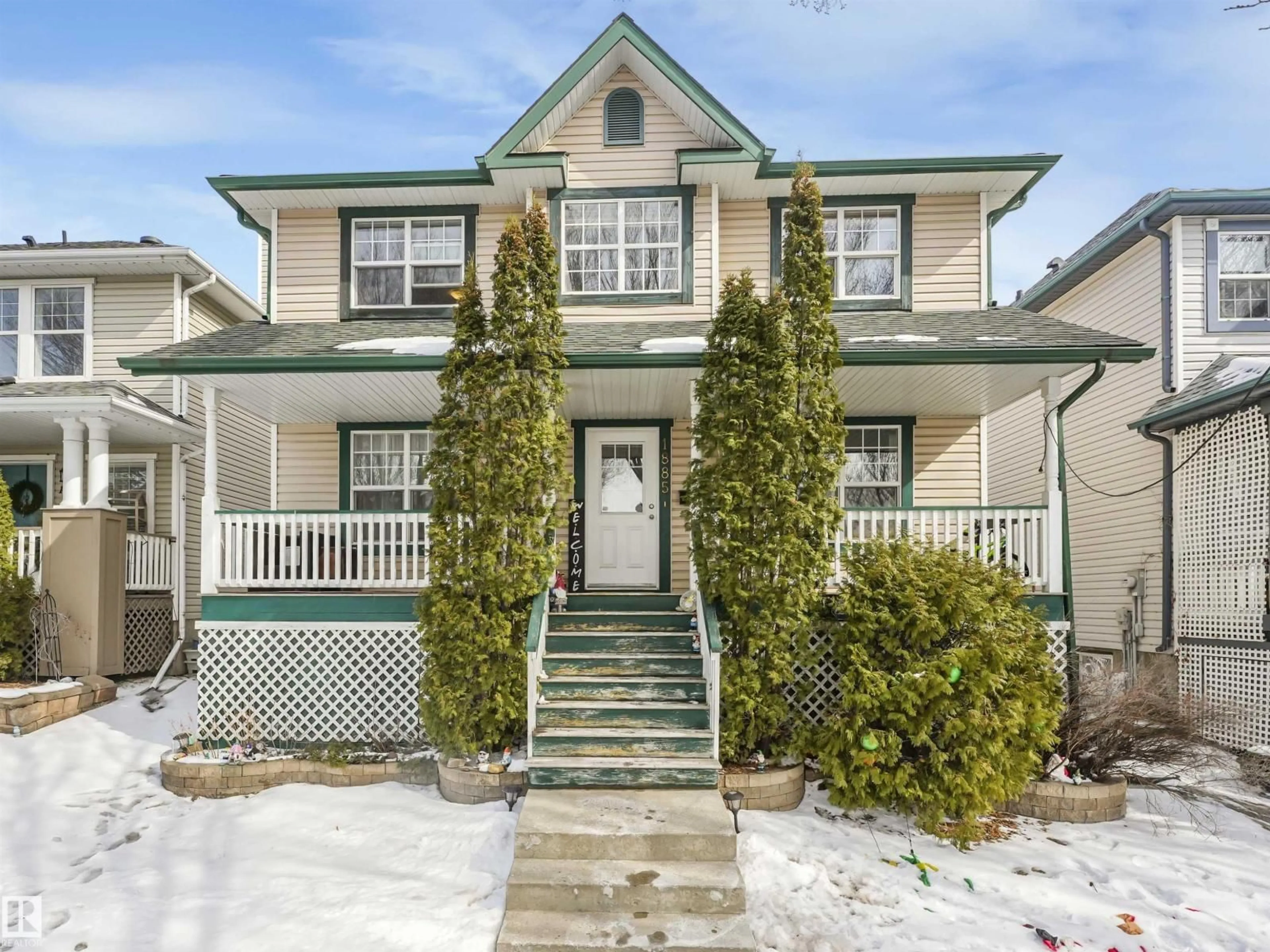 Home with vinyl exterior material, street for 1885 TOMLINSON WY, Edmonton Alberta T6R2S6