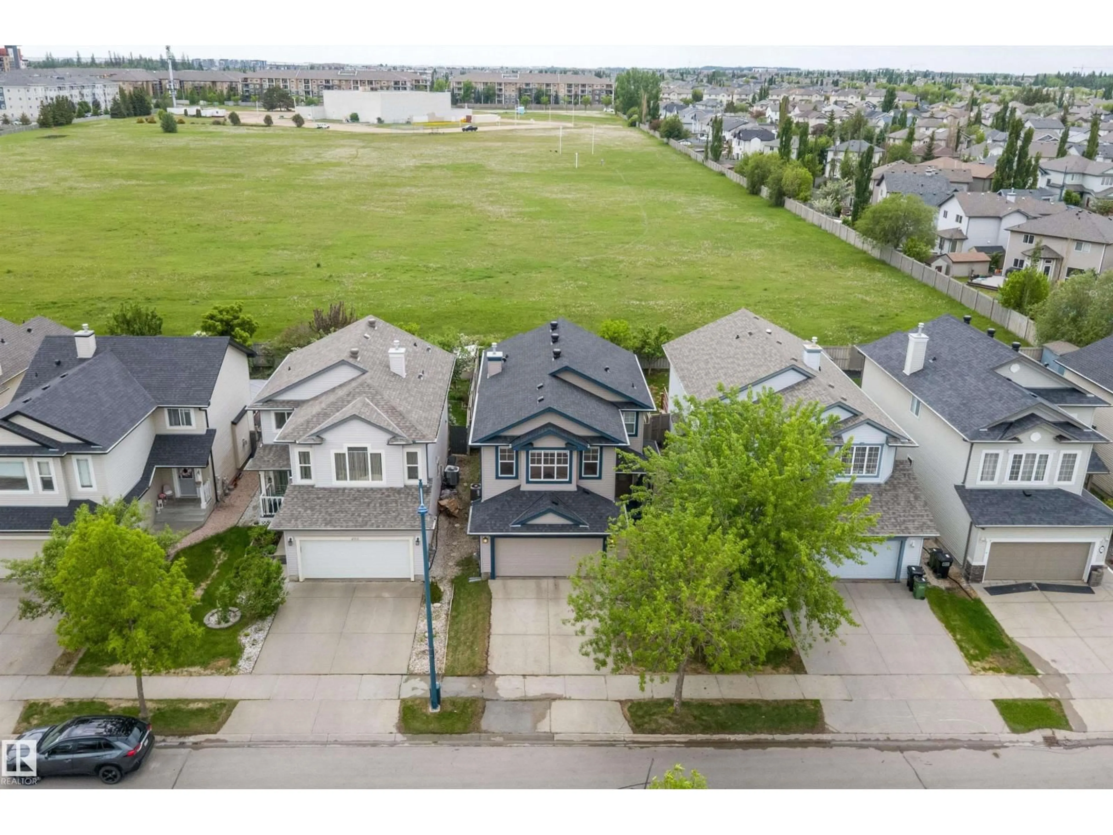 A pic from outside/outdoor area/front of a property/back of a property/a pic from drone, street for 205 MACEWAN RD, Edmonton Alberta T6W1R2