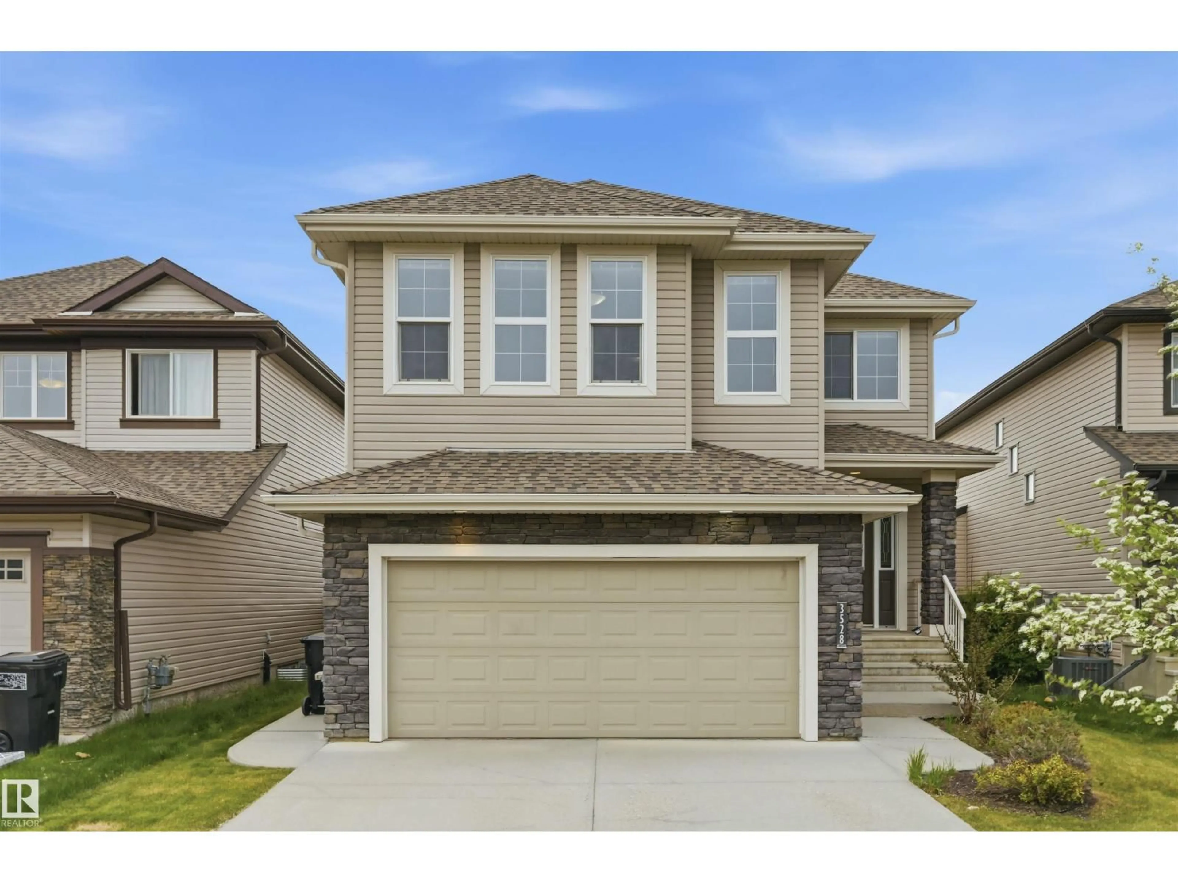 Home with vinyl exterior material, street for 3528 CLAXTON CR, Edmonton Alberta T6W0Z6