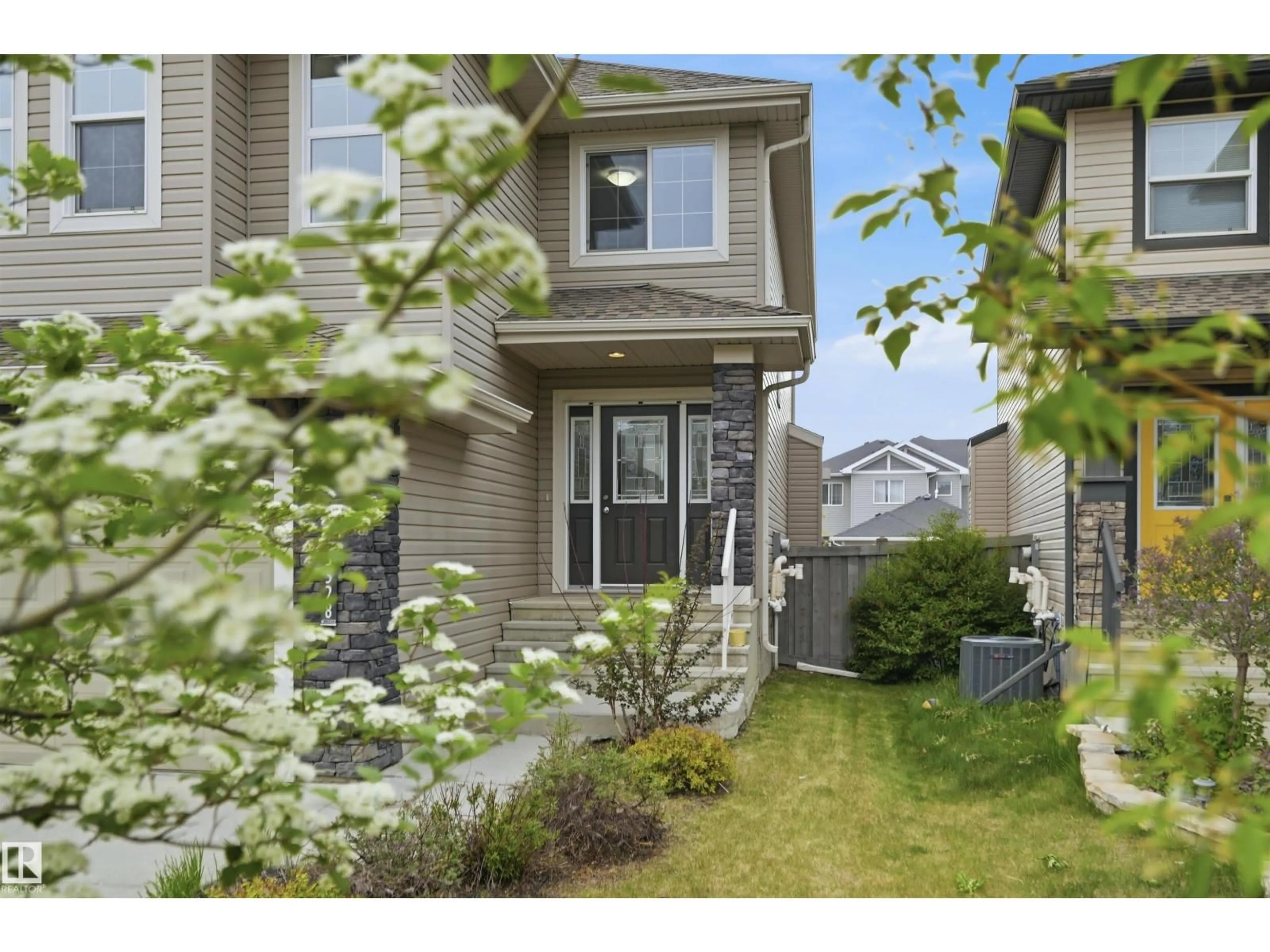 Home with vinyl exterior material, street for 3528 CLAXTON CR, Edmonton Alberta T6W0Z6