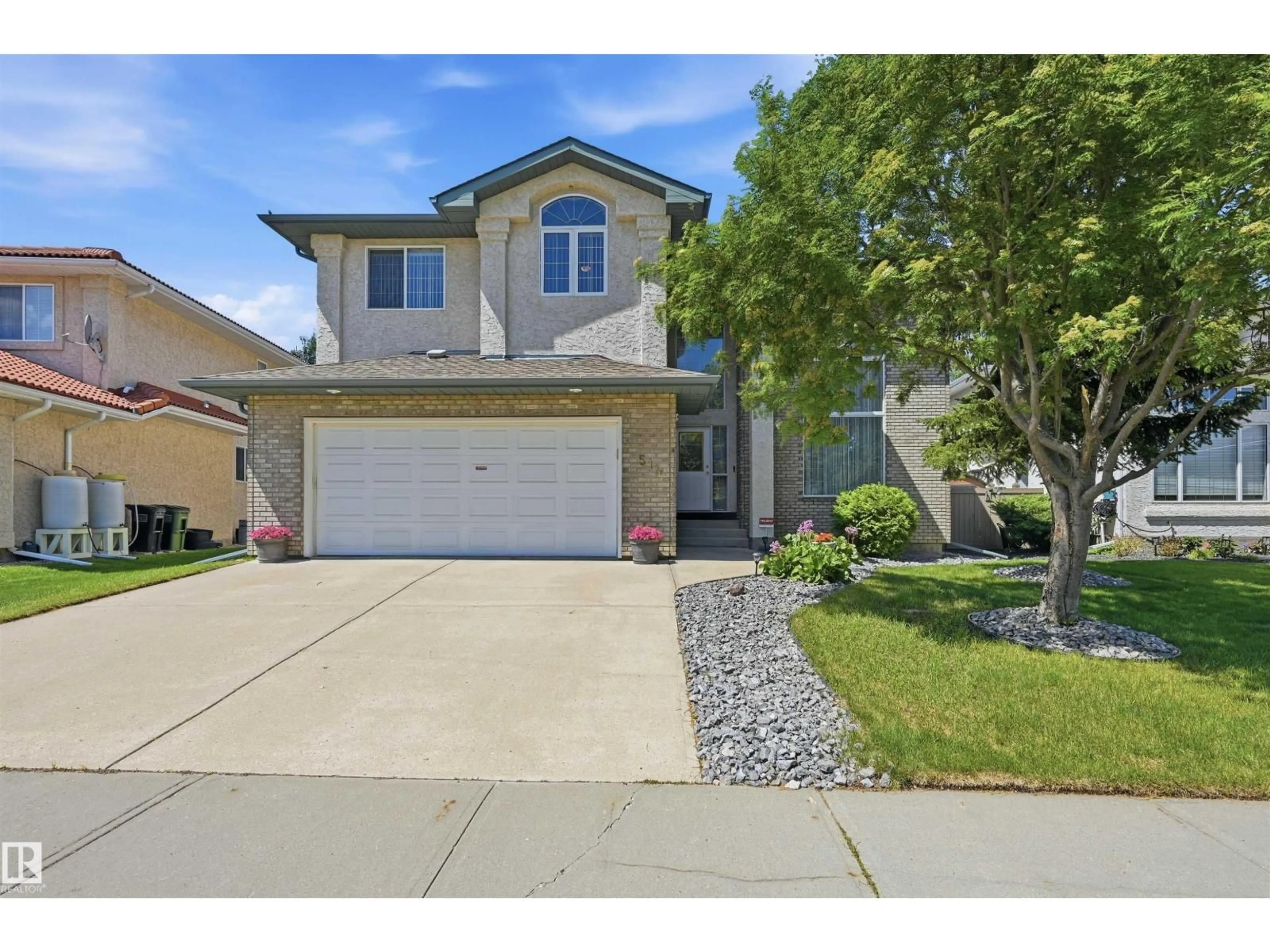 Home with vinyl exterior material, street for 514 BUTTERWORTH WY, Edmonton Alberta T6R2G8