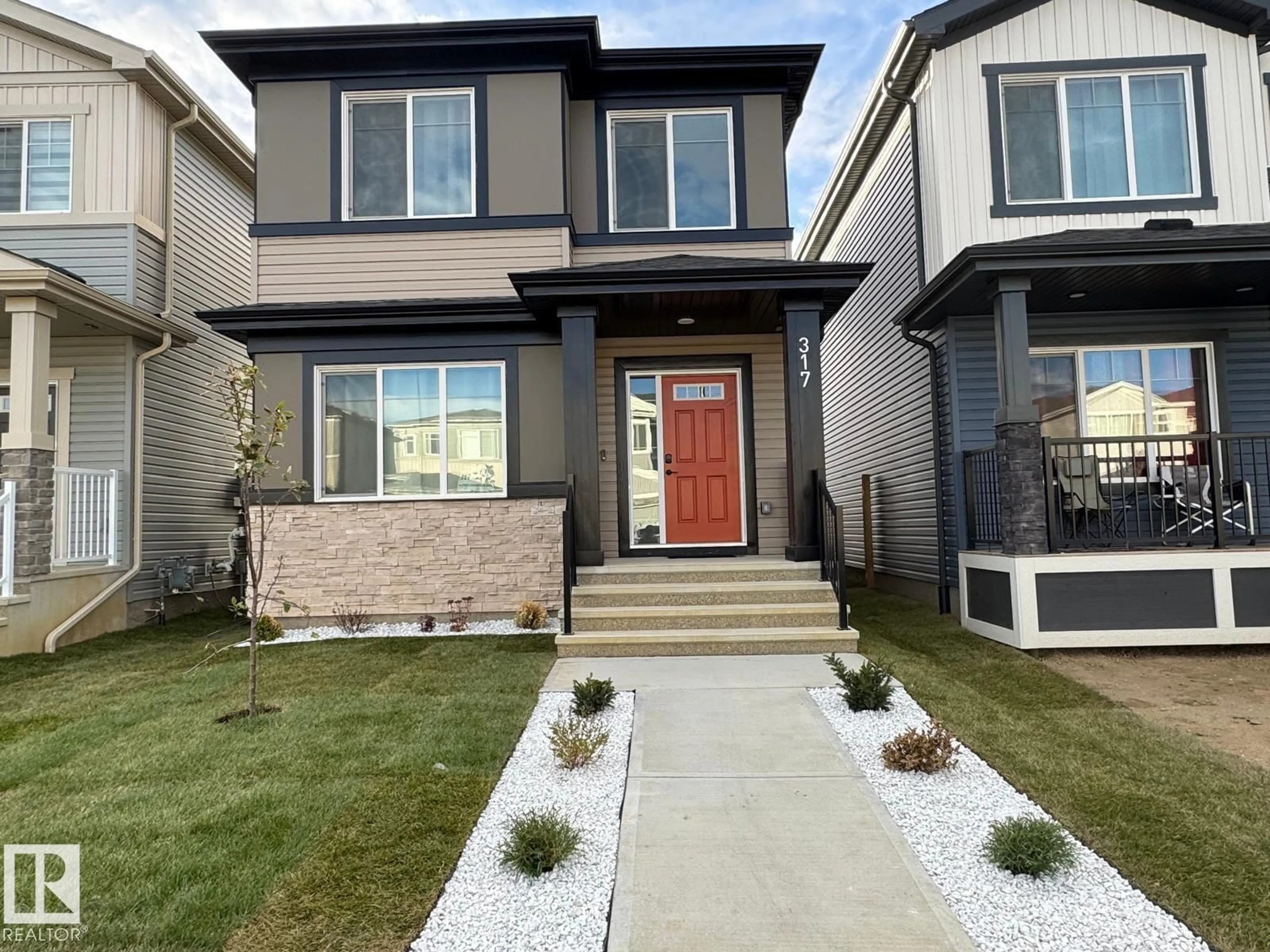 Home with brick exterior material, street for 317 JUNIPER CV, Leduc Alberta T9E1S6