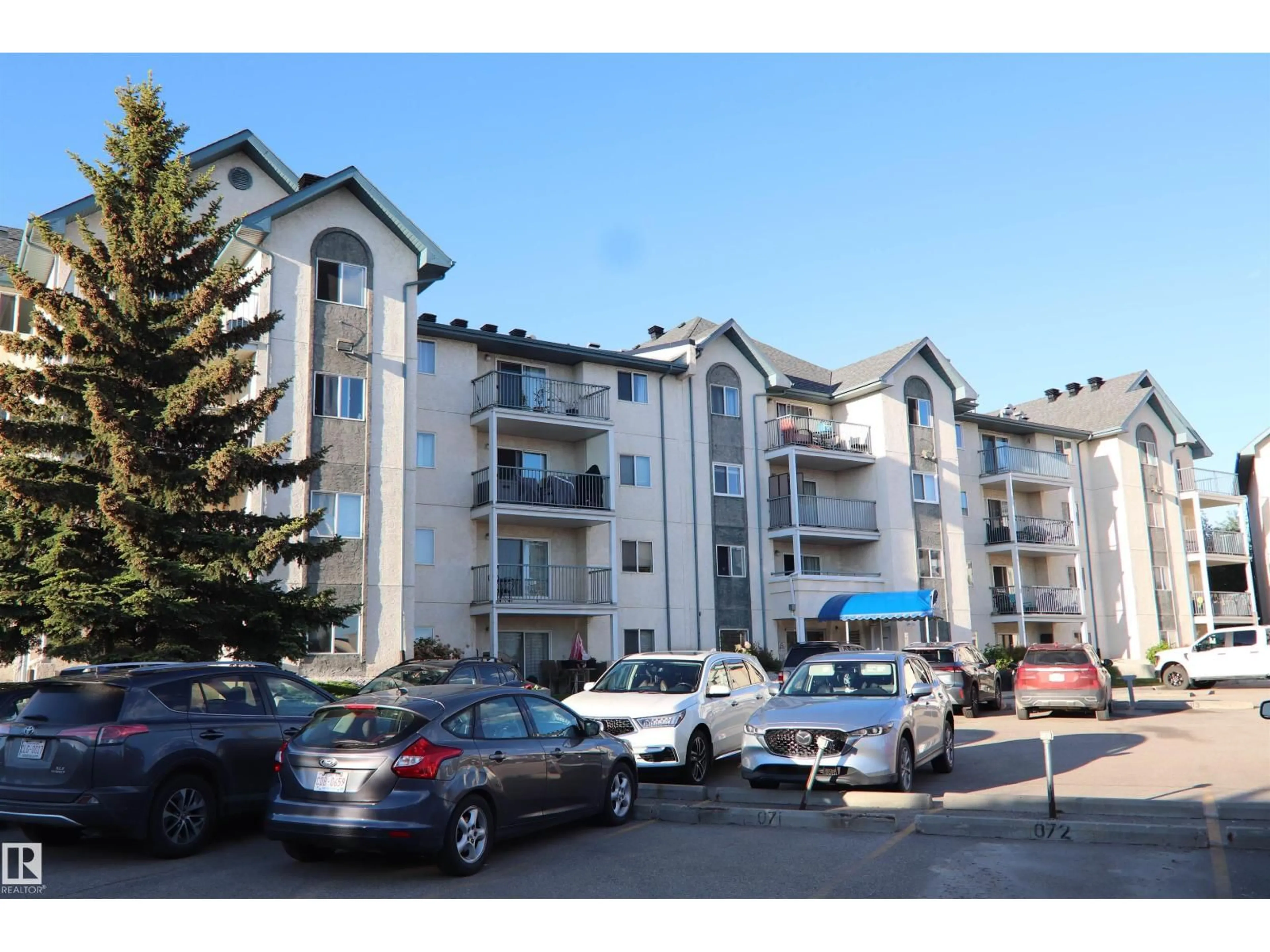 A pic from outside/outdoor area/front of a property/back of a property/a pic from drone, unknown for #421 - 6720 158 AV, Edmonton Alberta T5Z3B1