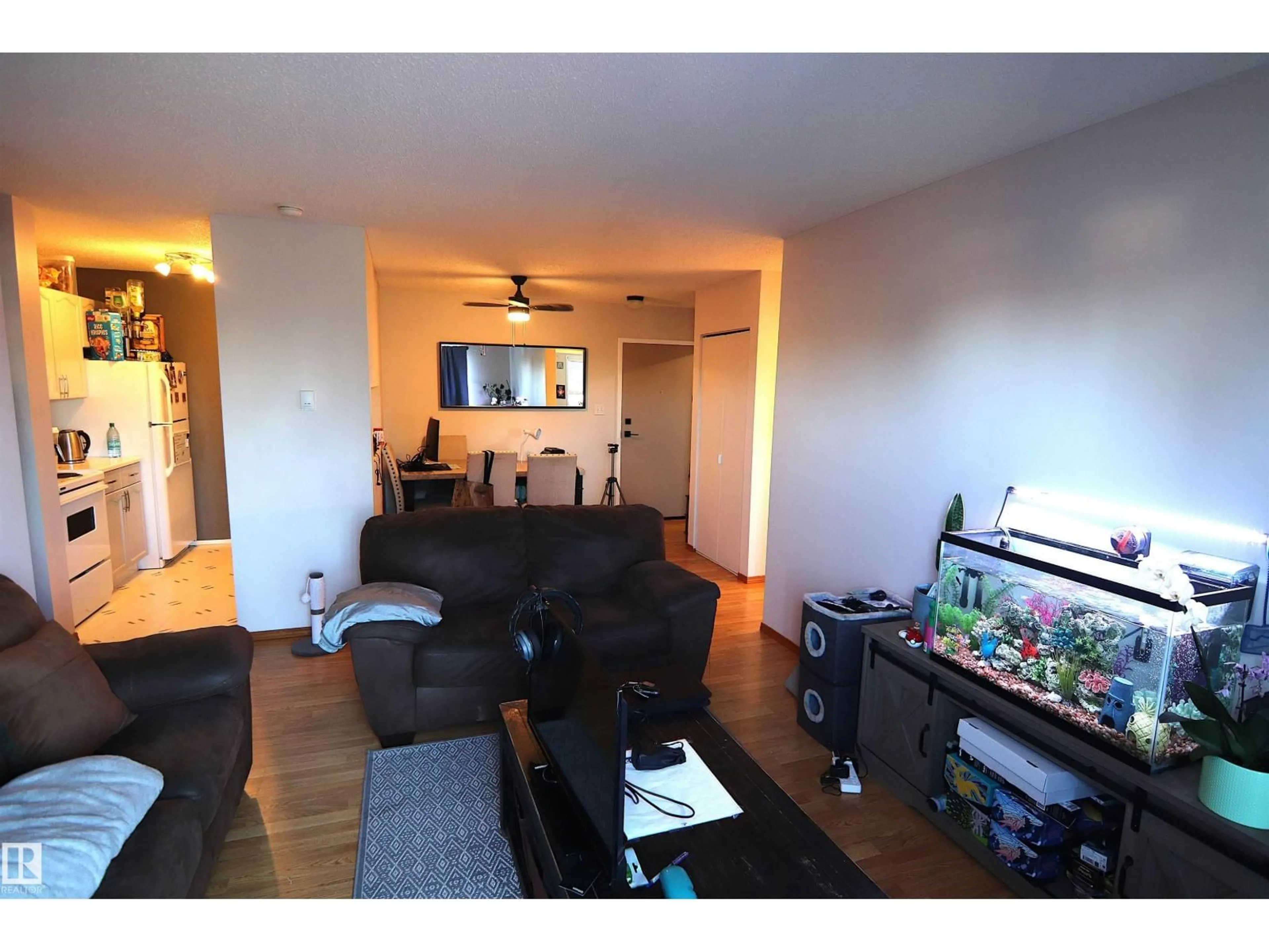 Living room with furniture, wood/laminate floor for #421 - 6720 158 AV, Edmonton Alberta T5Z3B1