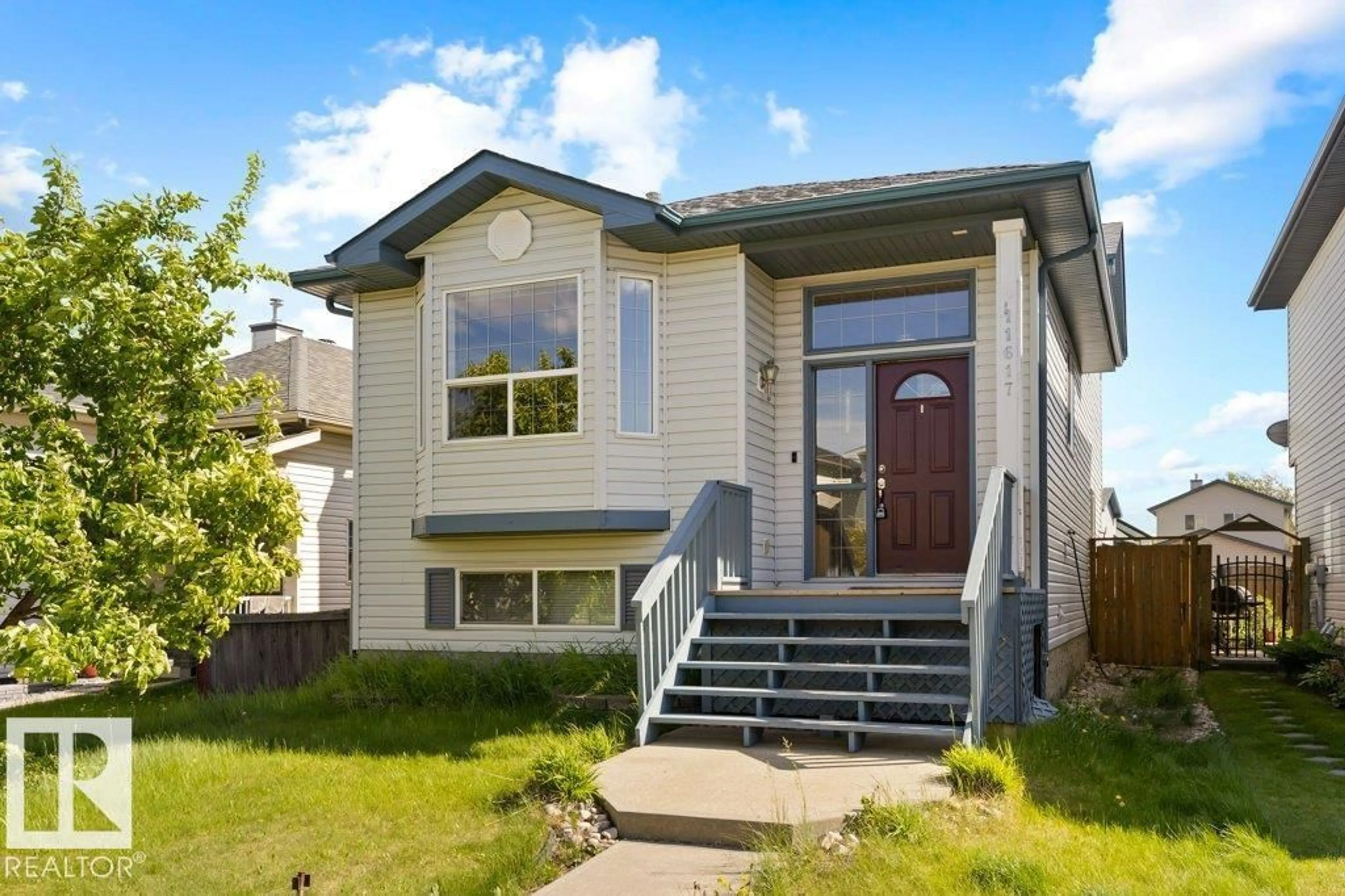 Home with vinyl exterior material, street for 11617 167B AV, Edmonton Alberta T5X6B8