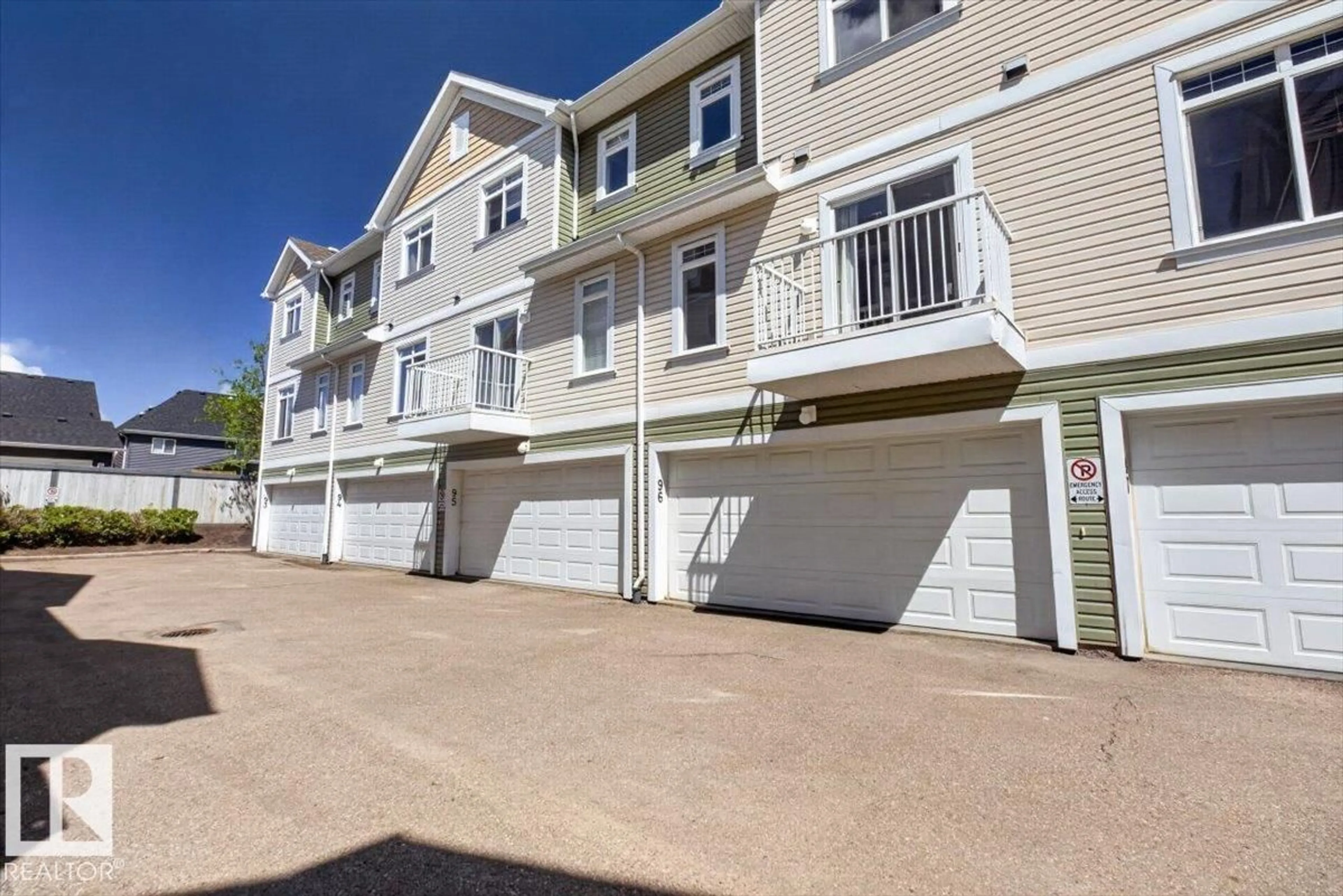 A pic from outside/outdoor area/front of a property/back of a property/a pic from drone, street for 1804 - 96 70 ST, Edmonton Alberta T6X0H4