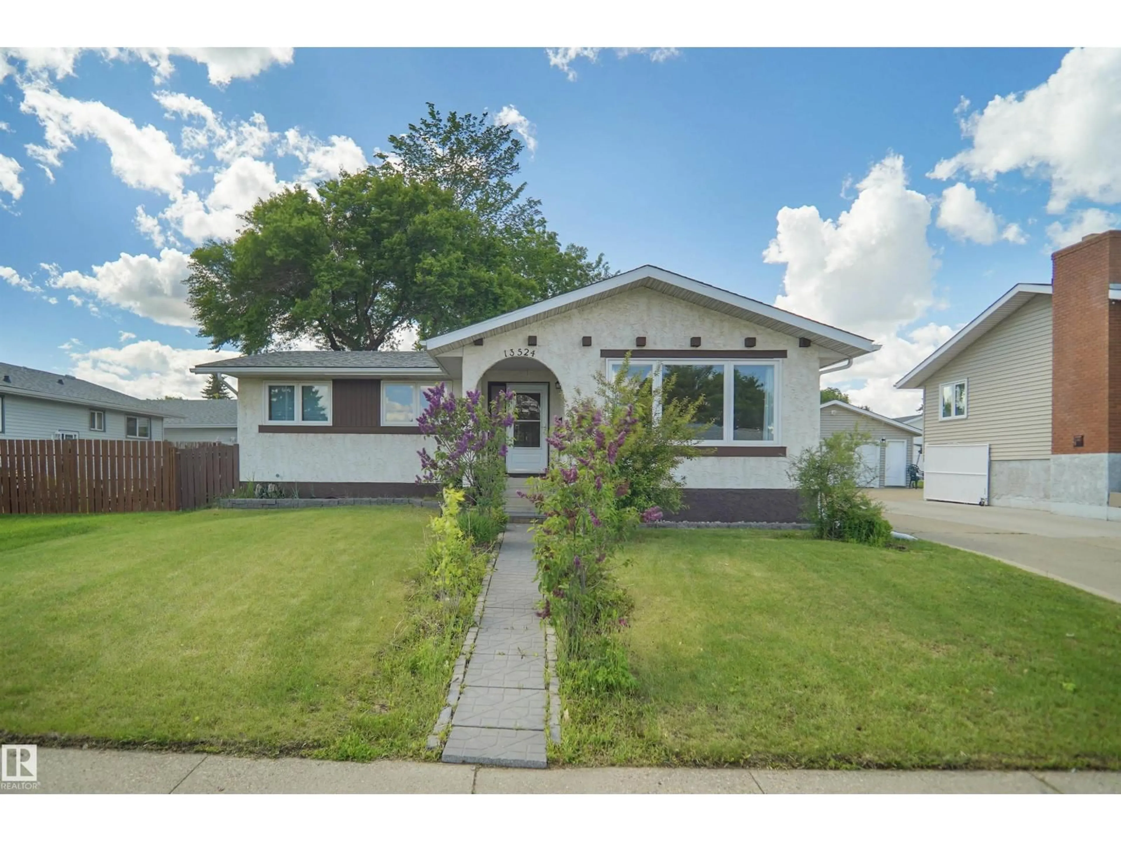 Home with vinyl exterior material, street for 13524 26 ST, Edmonton Alberta T5A3W1