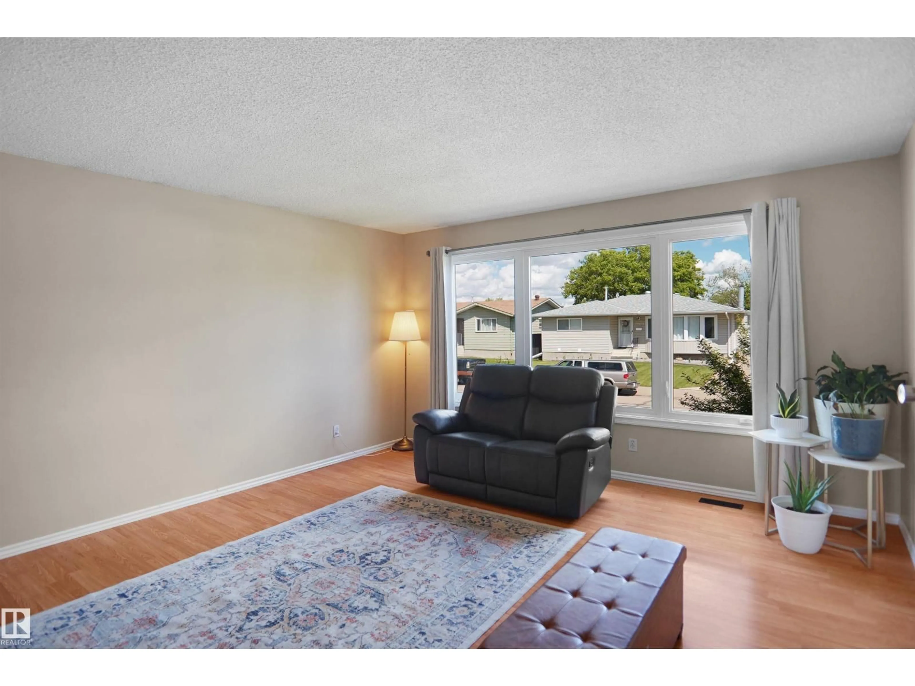 Living room with furniture, unknown for 13524 26 ST, Edmonton Alberta T5A3W1
