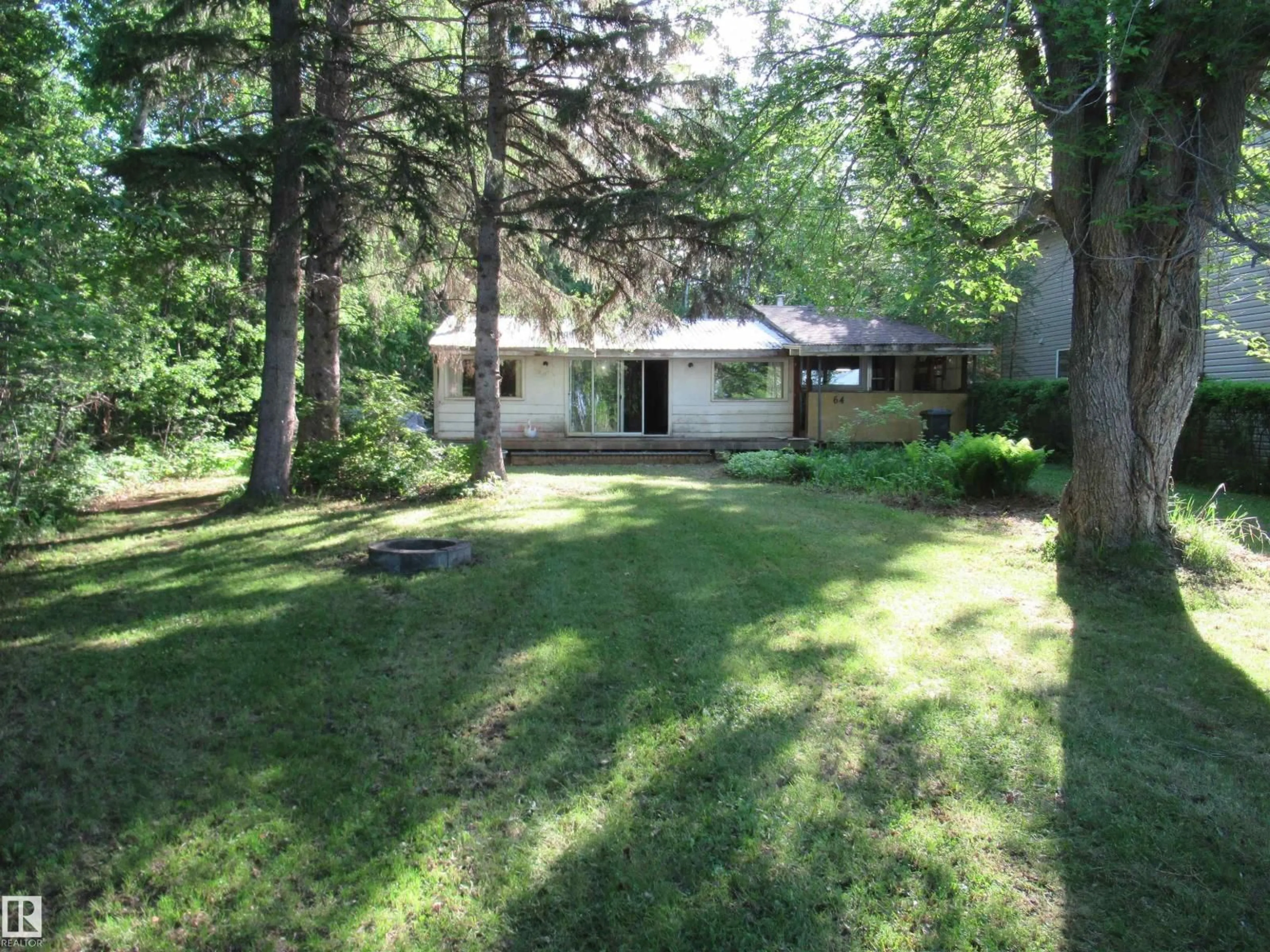 A pic from outside/outdoor area/front of a property/back of a property/a pic from drone, forest/trees view for 64 SUNDANCE BE, Rural Leduc County Alberta T0C2P0