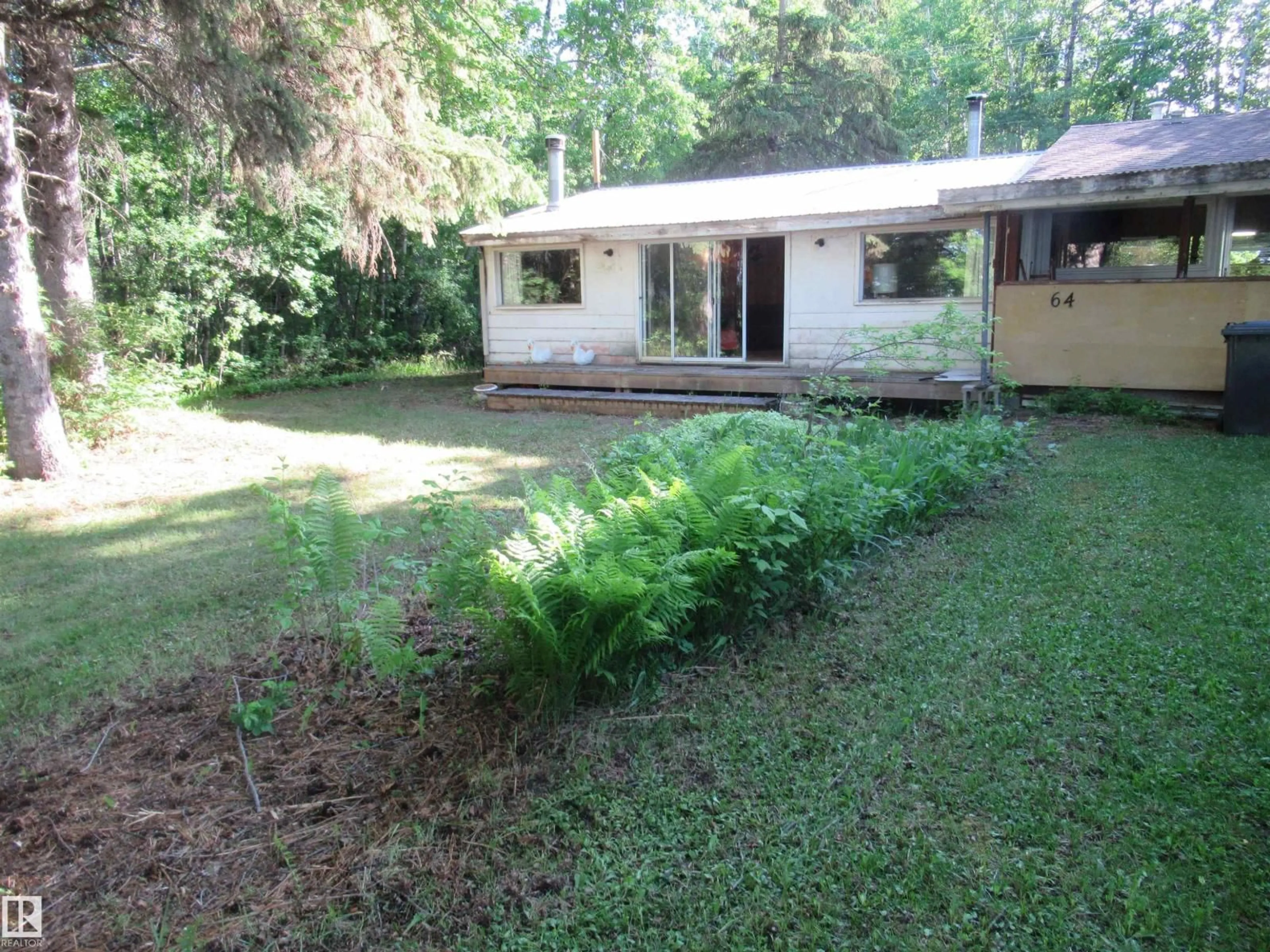A pic from outside/outdoor area/front of a property/back of a property/a pic from drone, unknown for 64 SUNDANCE BE, Rural Leduc County Alberta T0C2P0