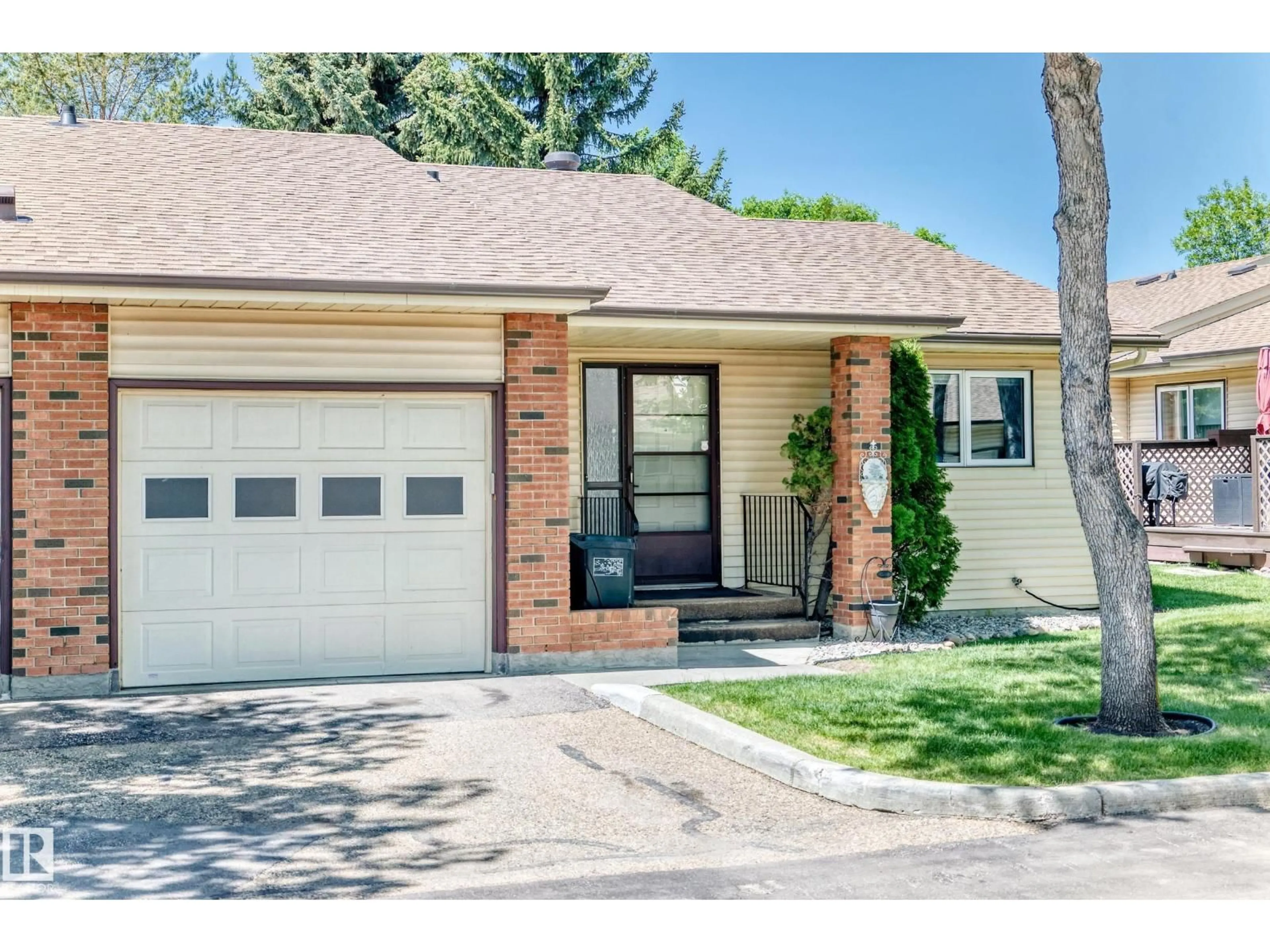 Home with brick exterior material, street for 10822 11 AV, Edmonton Alberta T6J6J1