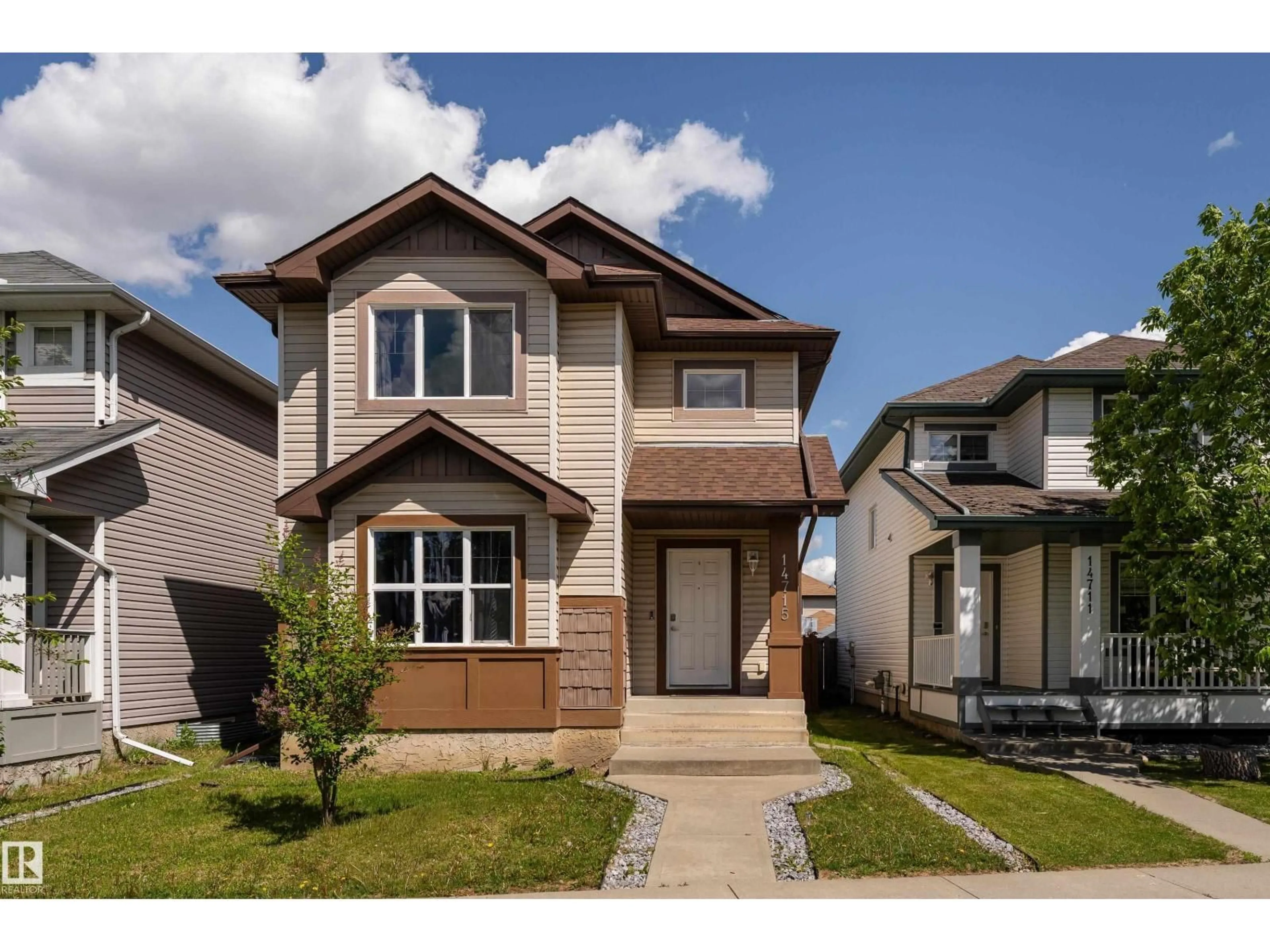 Home with vinyl exterior material, street for NW - 14715 141 ST, Edmonton Alberta T6V0A8