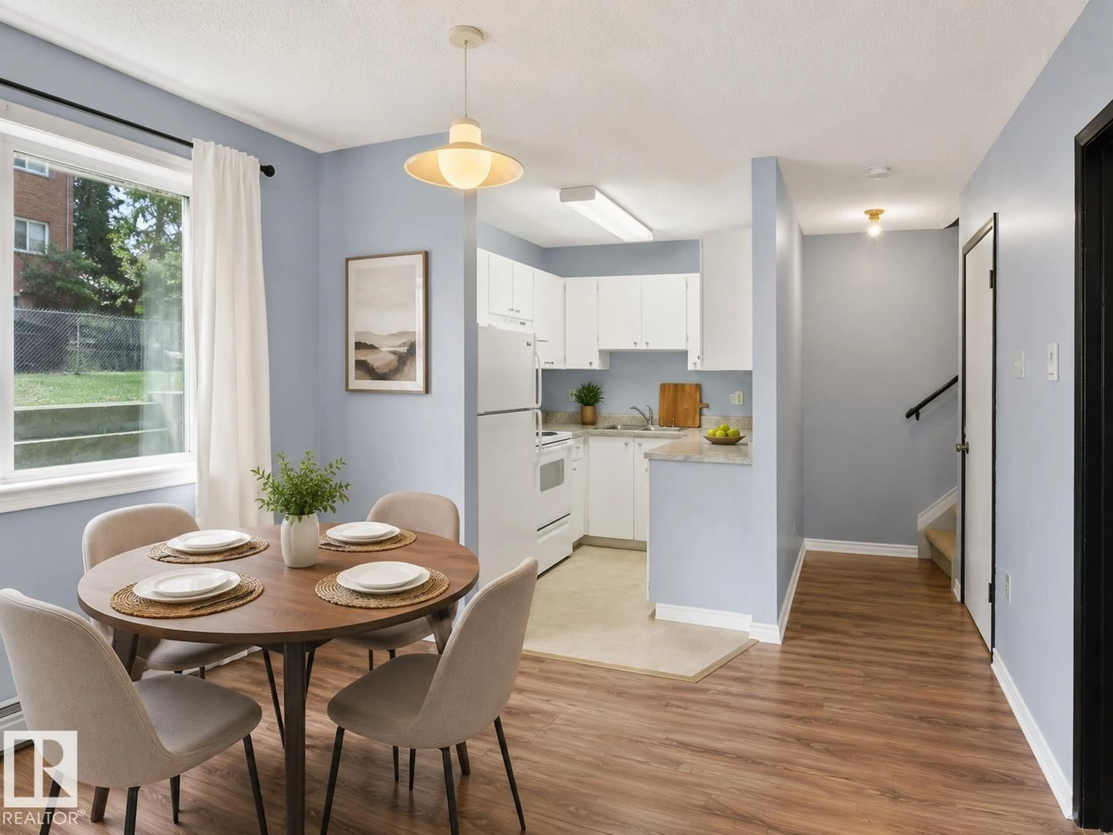 Open concept kitchen, wood/laminate floor for 13450 FORT RD, Edmonton Alberta T5A1C5