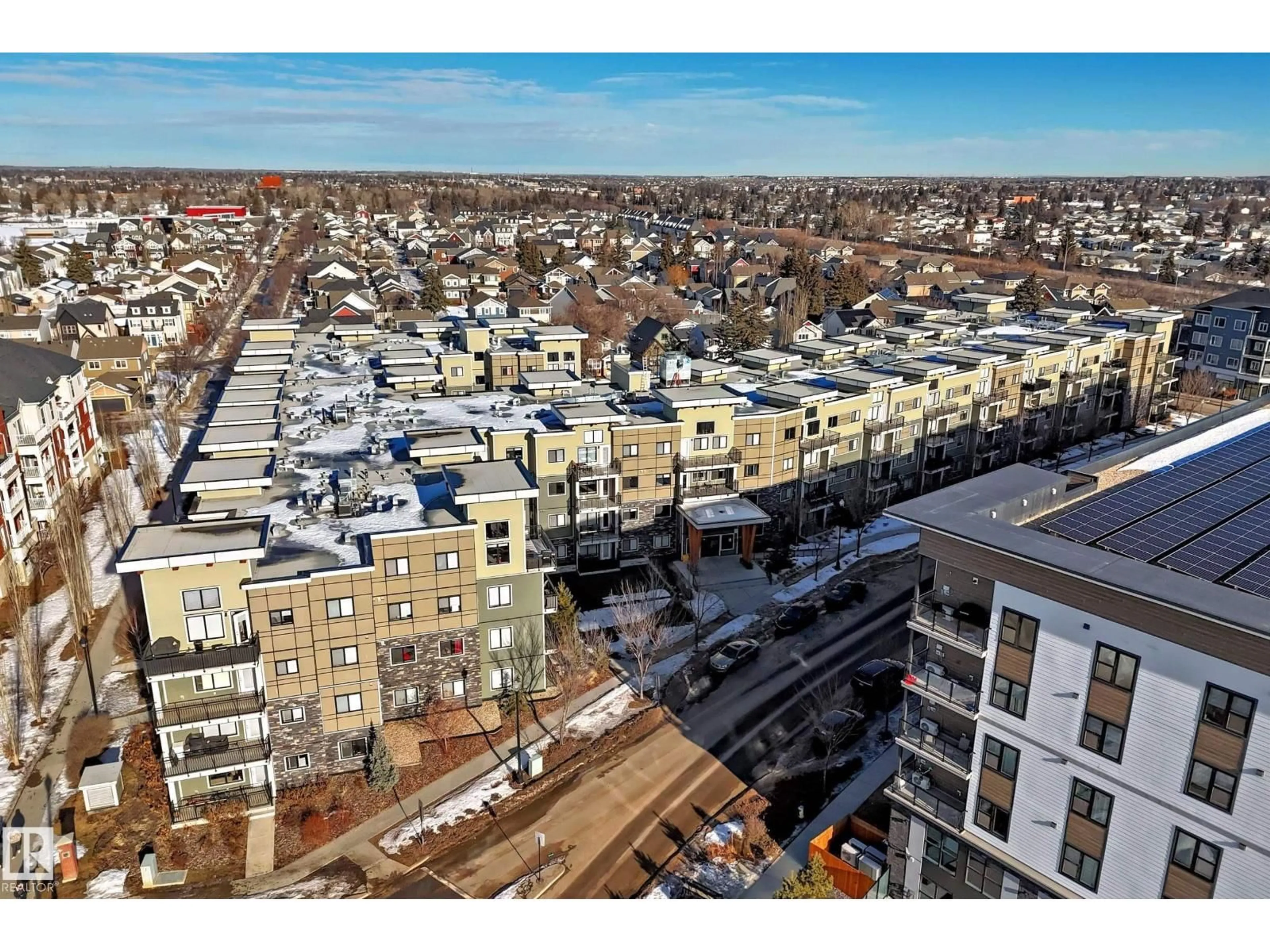 A pic from outside/outdoor area/front of a property/back of a property/a pic from drone, city buildings view from balcony for 560 - 440 GRIESBACH PARADE PR, Edmonton Alberta T5E6X1