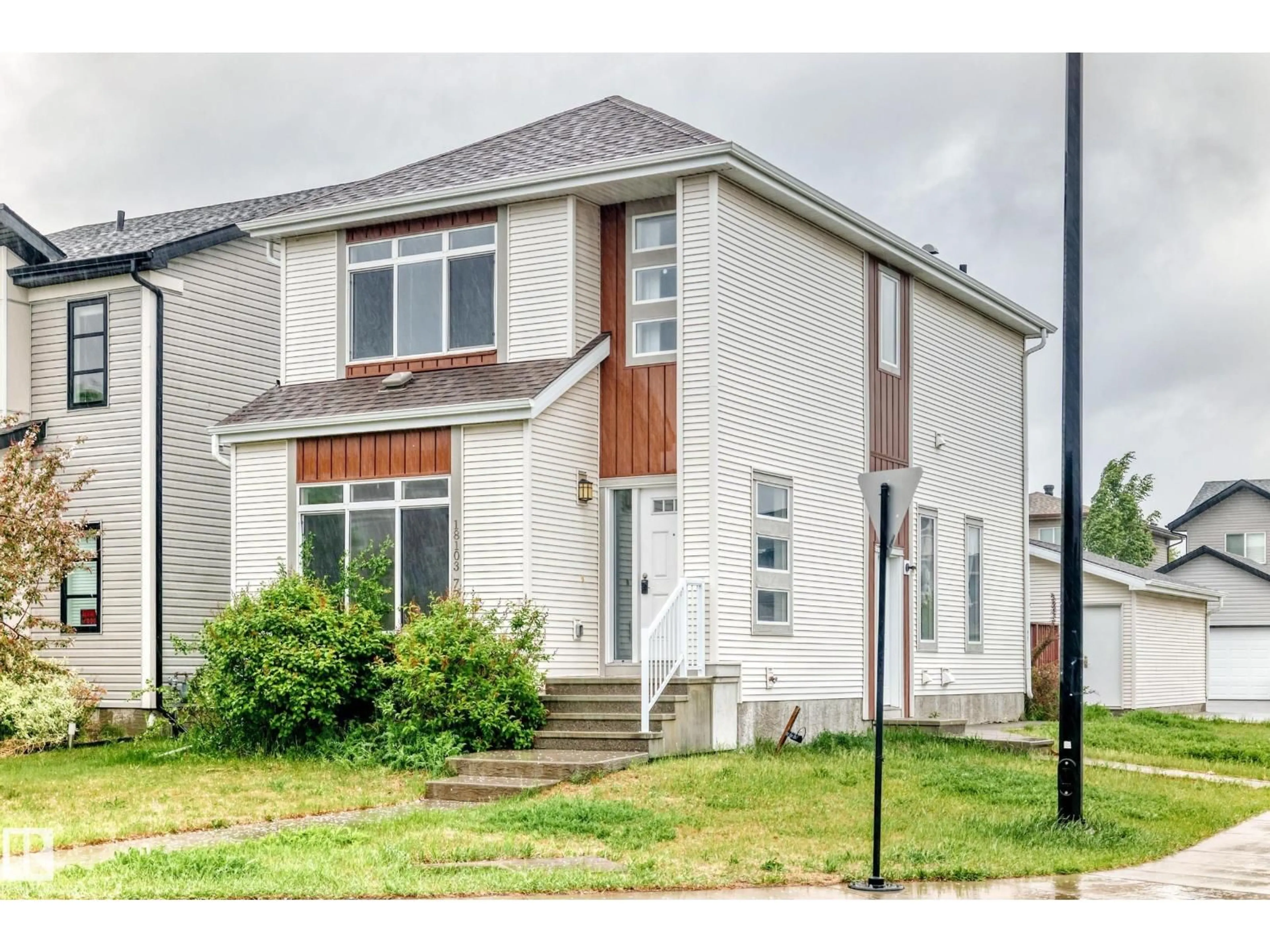 Home with vinyl exterior material, street for 18103 77 ST, Edmonton Alberta T5Z0L8