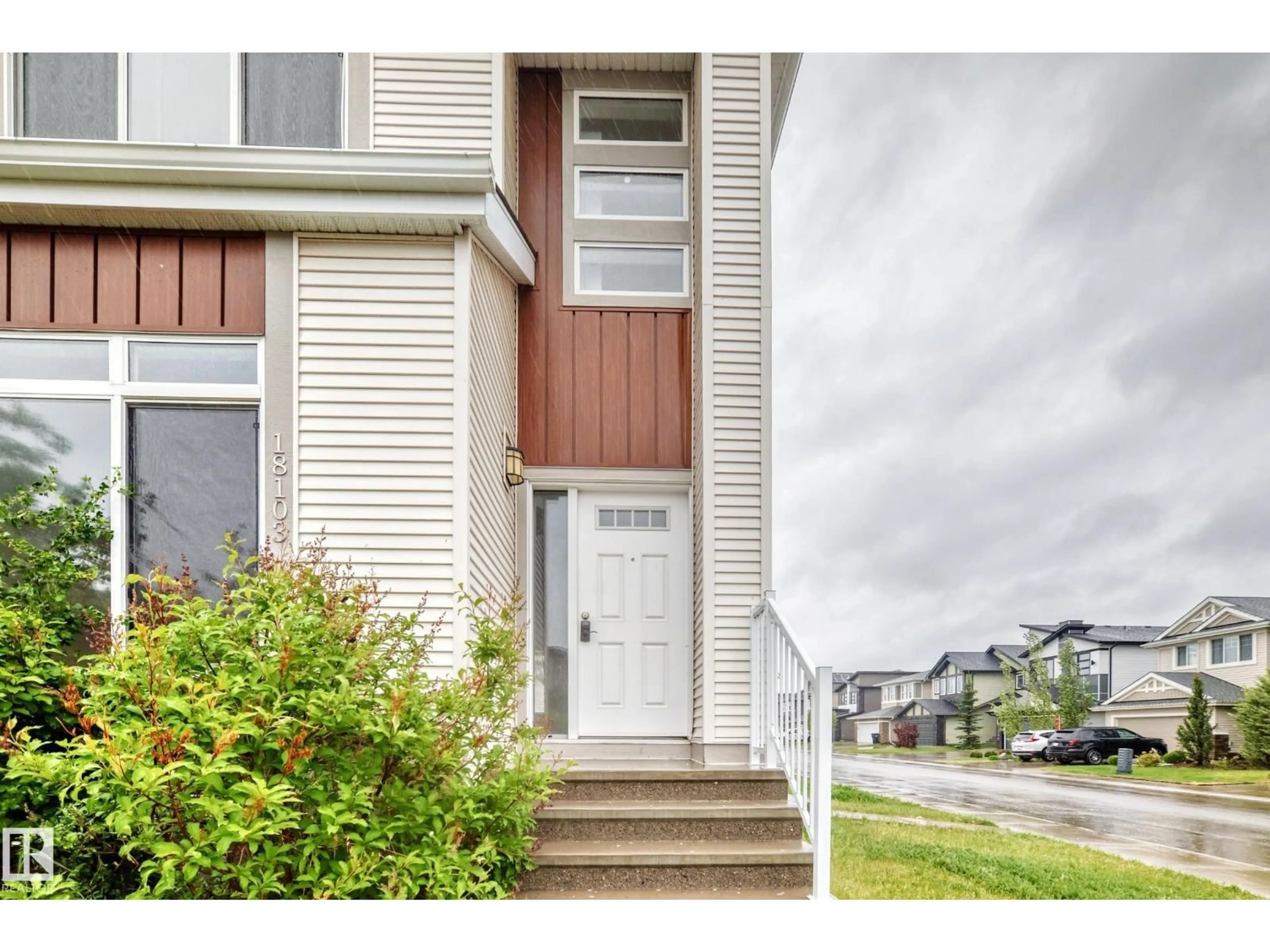 Home with vinyl exterior material, street for 18103 77 ST, Edmonton Alberta T5Z0L8