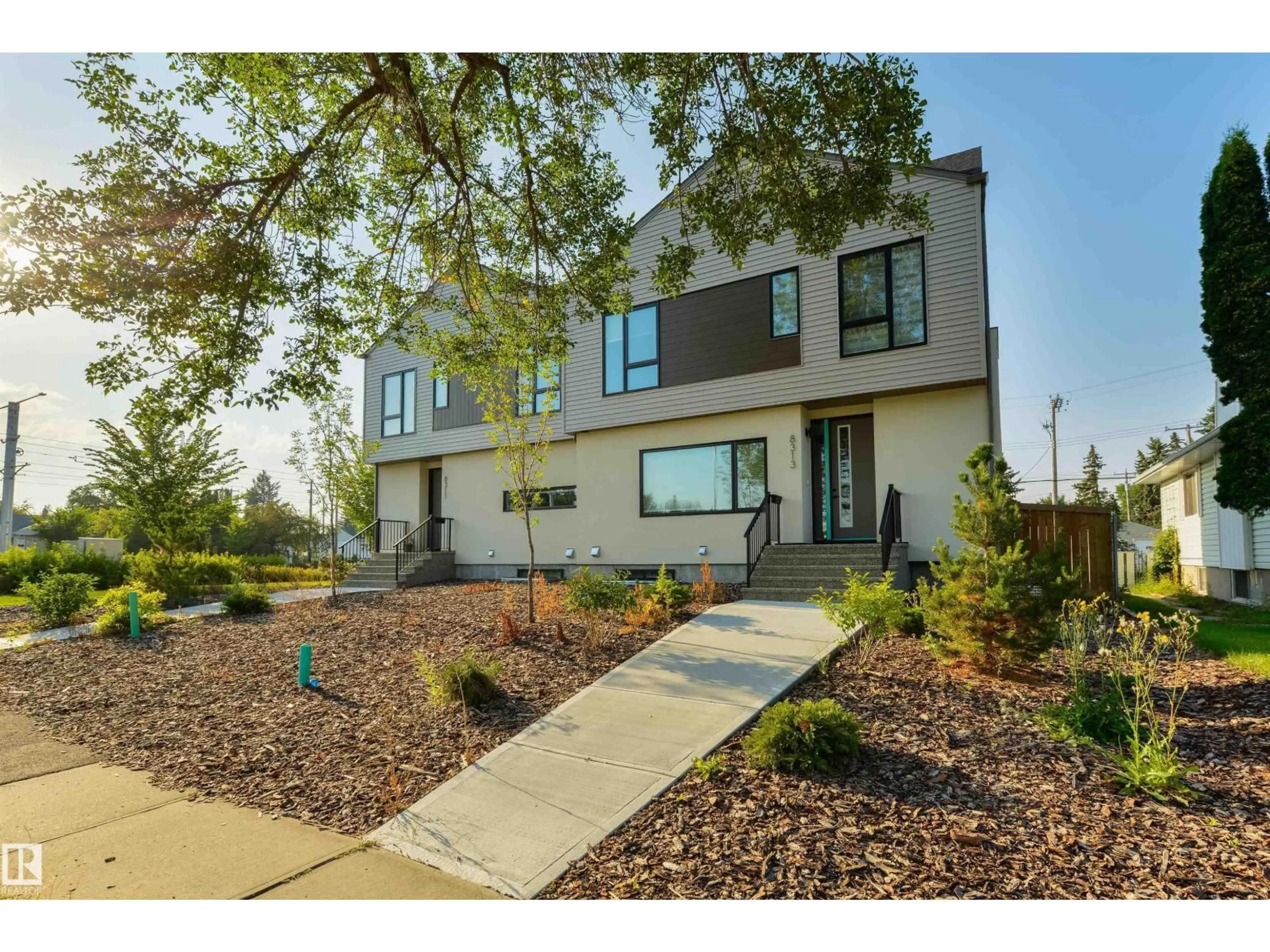 Home with brick exterior material, street for 8313 76 AV, Edmonton Alberta T6C0H9
