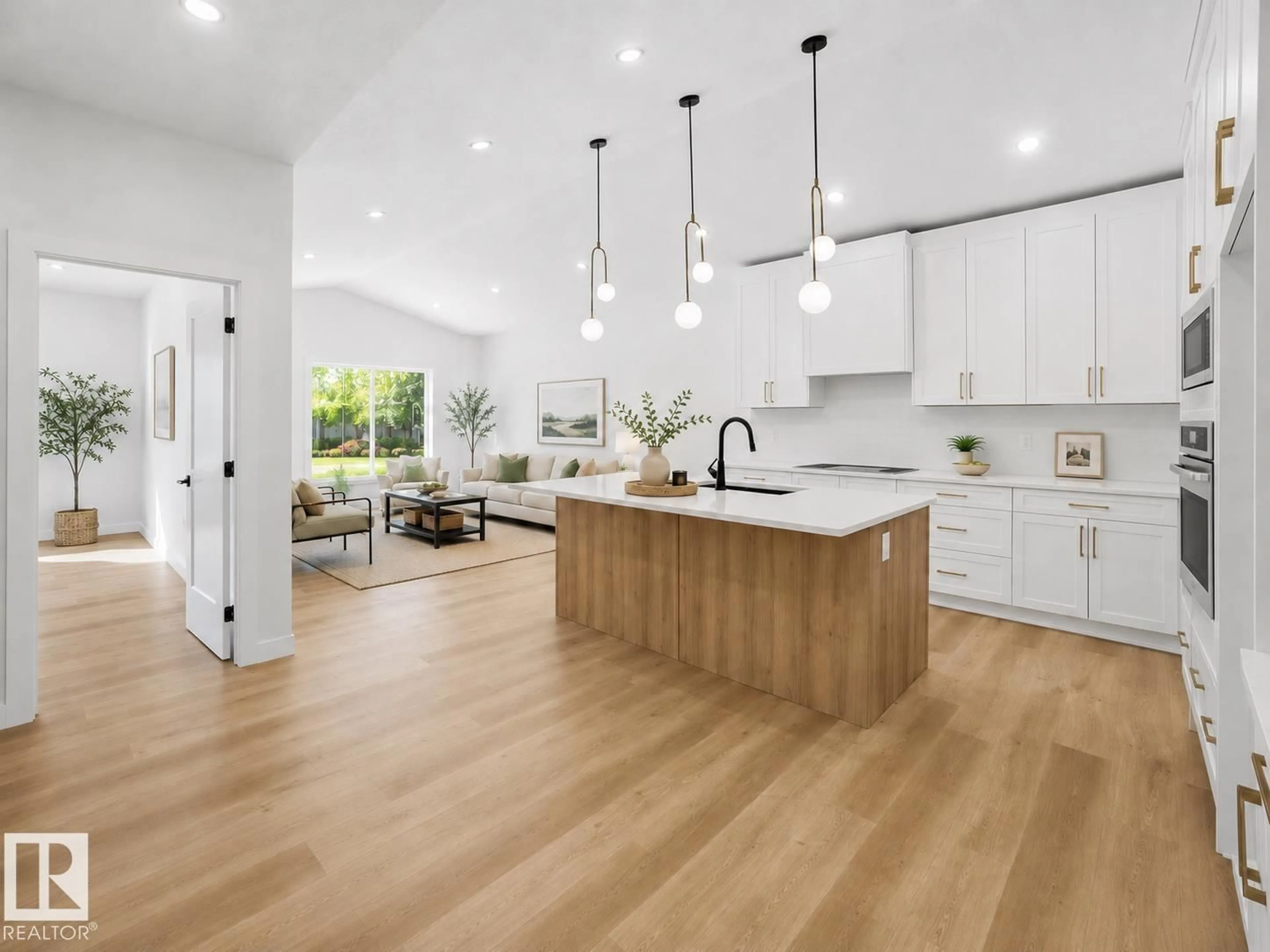 Open concept kitchen, wood/laminate floor for 3320 CHICKADEE DR, Edmonton Alberta T5S0V4