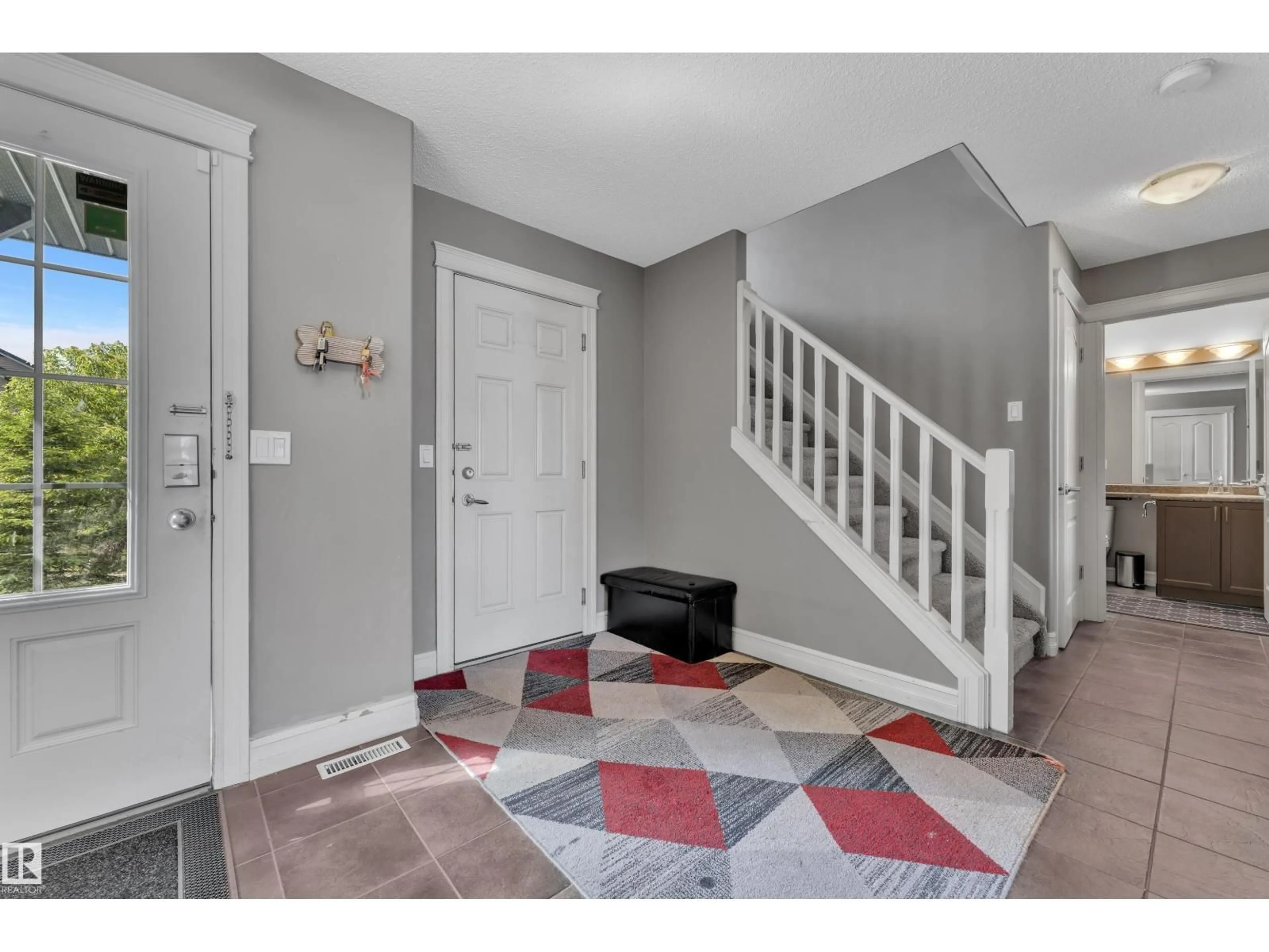 Indoor entryway for 6116 11 AV, Edmonton Alberta T6X0M4