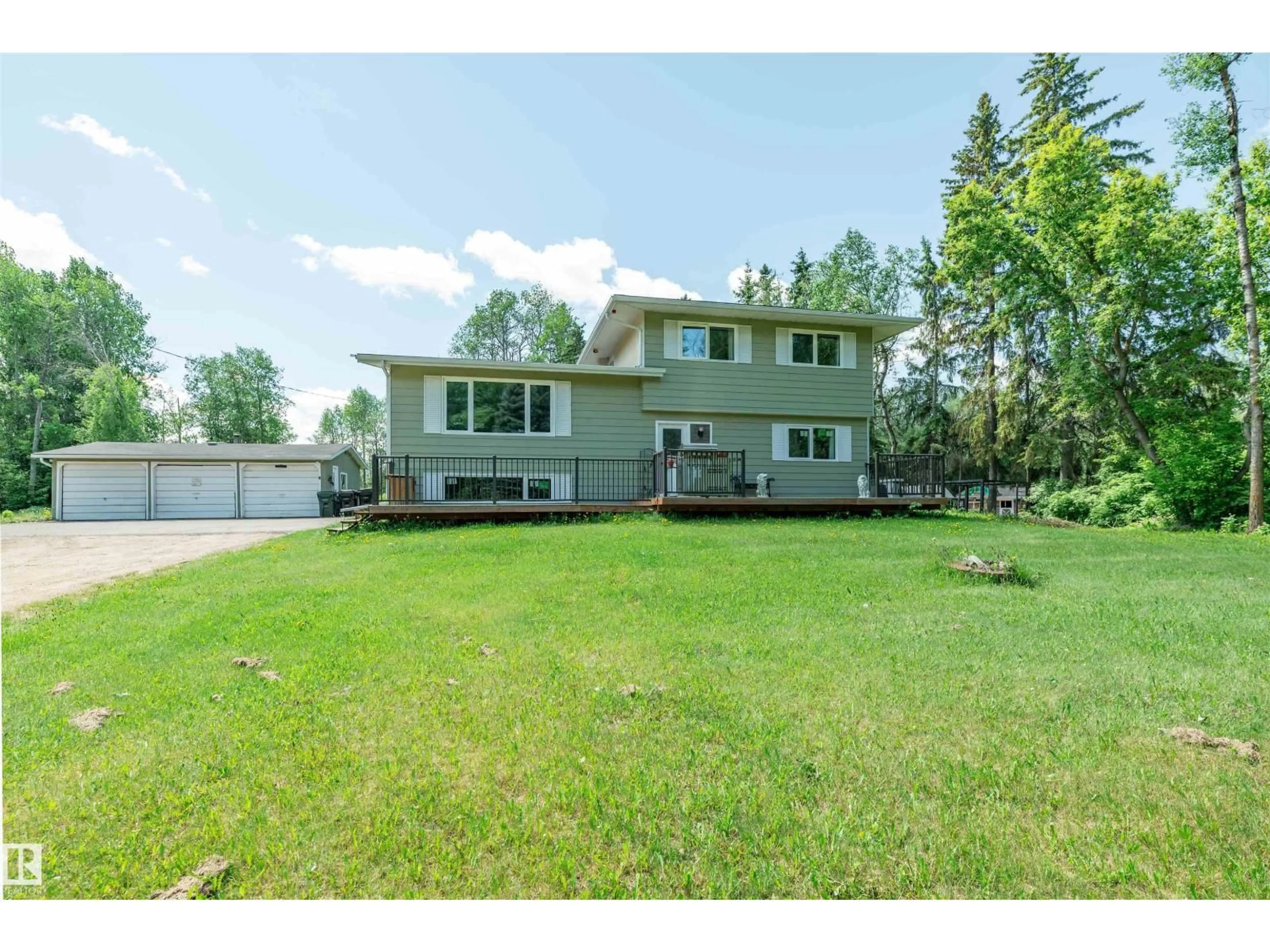 A pic from outside/outdoor area/front of a property/back of a property/a pic from drone, water/lake/river/ocean view for 22559 - 448 WYE RD, Rural Strathcona County Alberta T8B1L4