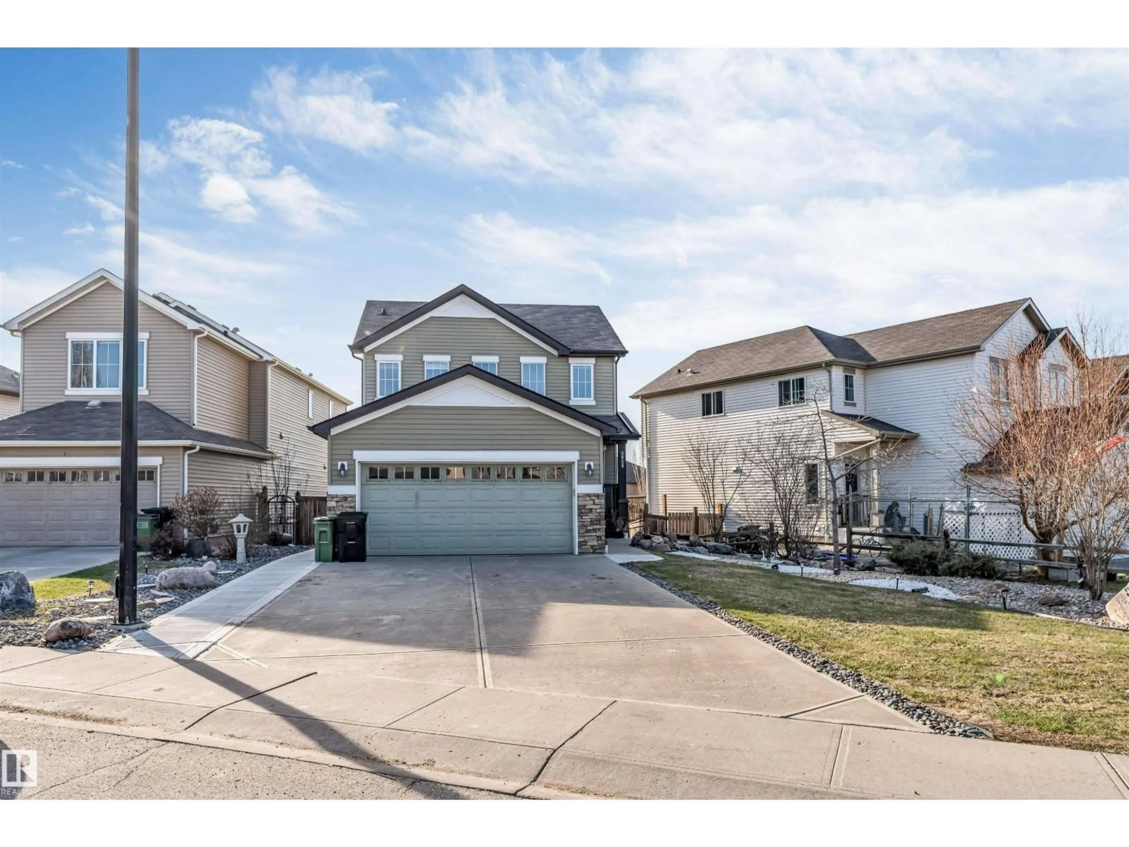 Home with vinyl exterior material, street for SW - 5928 12 AV, Edmonton Alberta T6X0M7