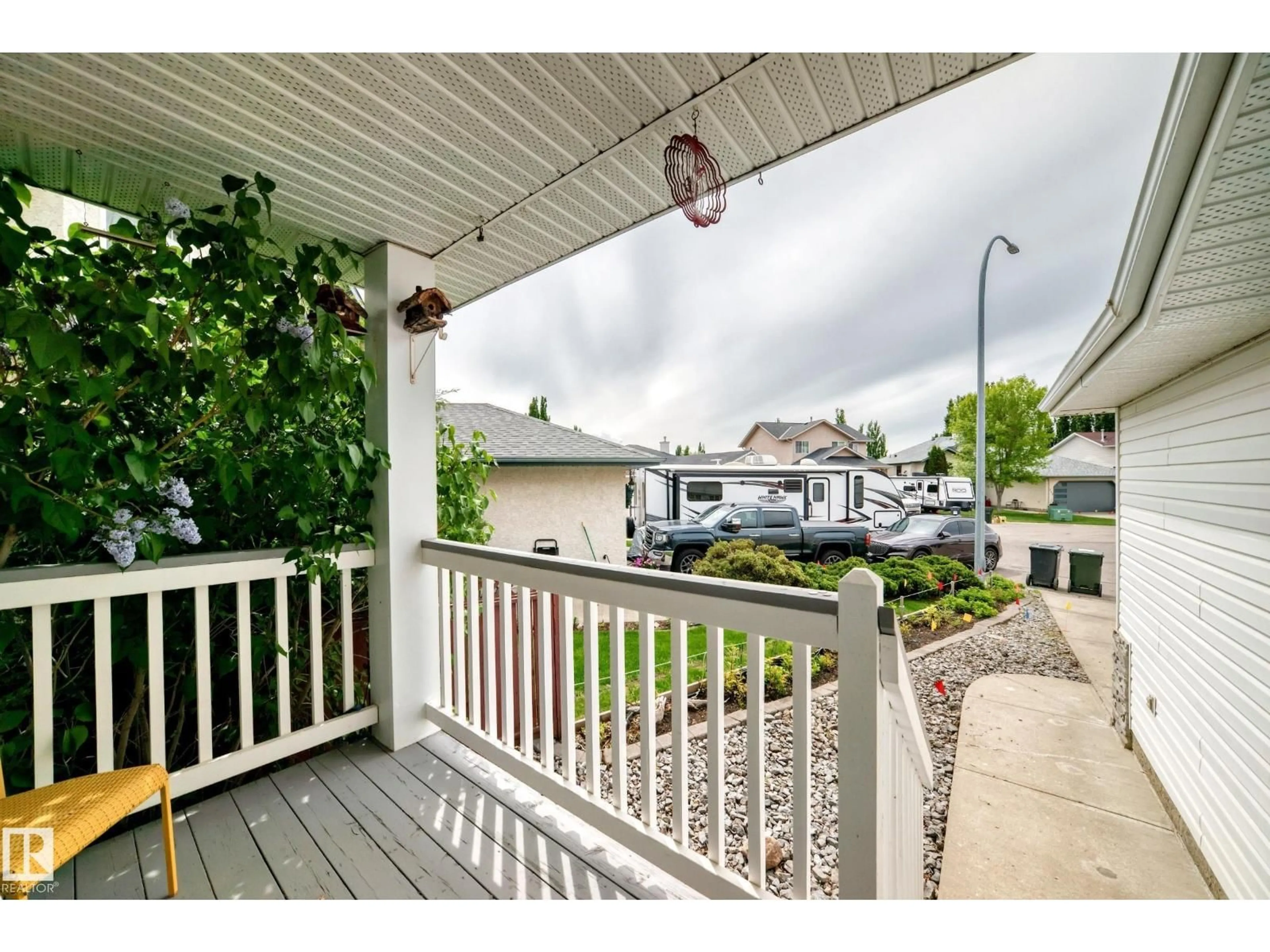 Patio, street for 220 KANANASKIS GR, Devon Alberta T9G1Y8