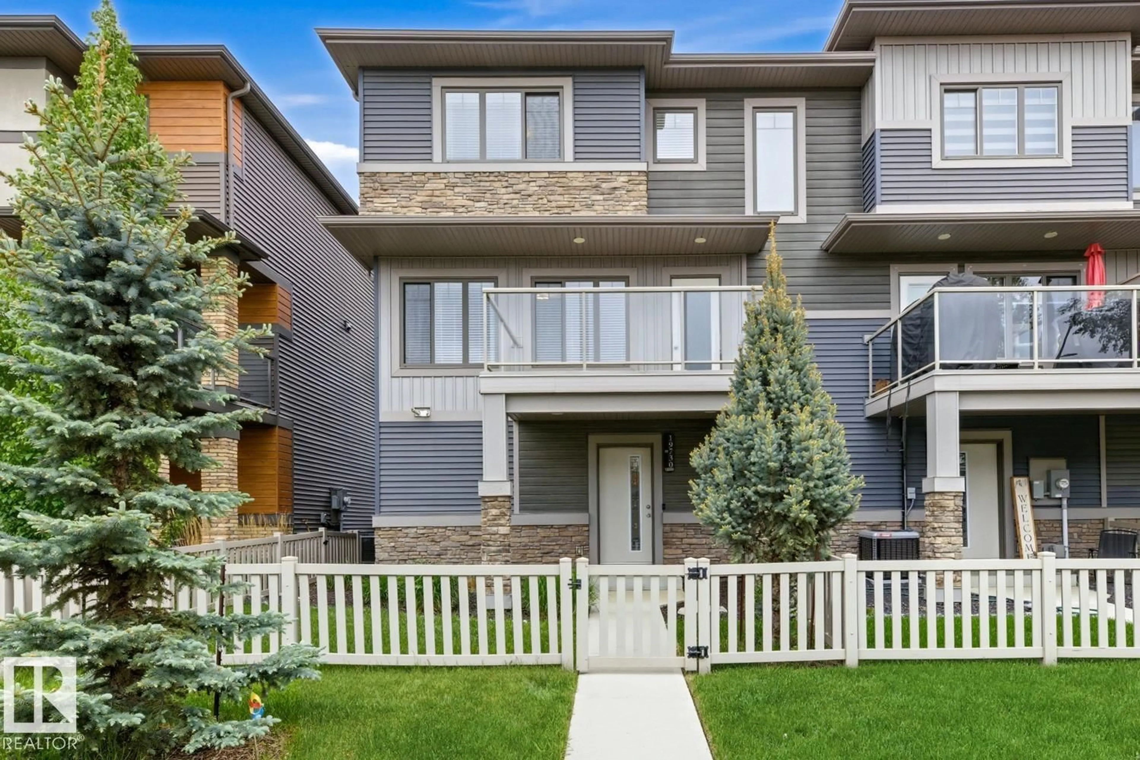 Home with vinyl exterior material, street for NW SW - 19730 26A AV, Edmonton Alberta T6M0W9