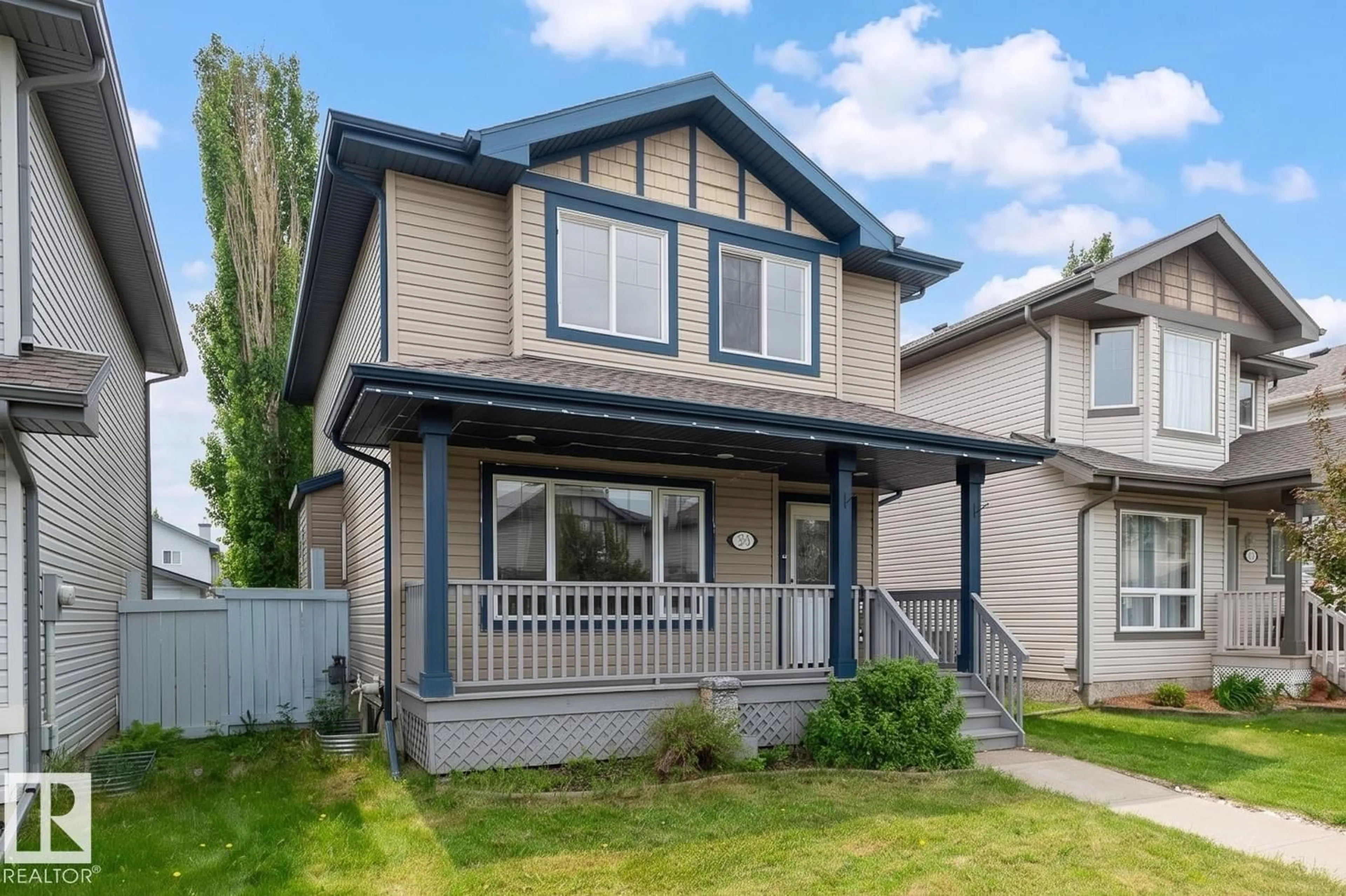 Home with vinyl exterior material, street for NW - 5919 203 ST, Edmonton Alberta T6M2Z3