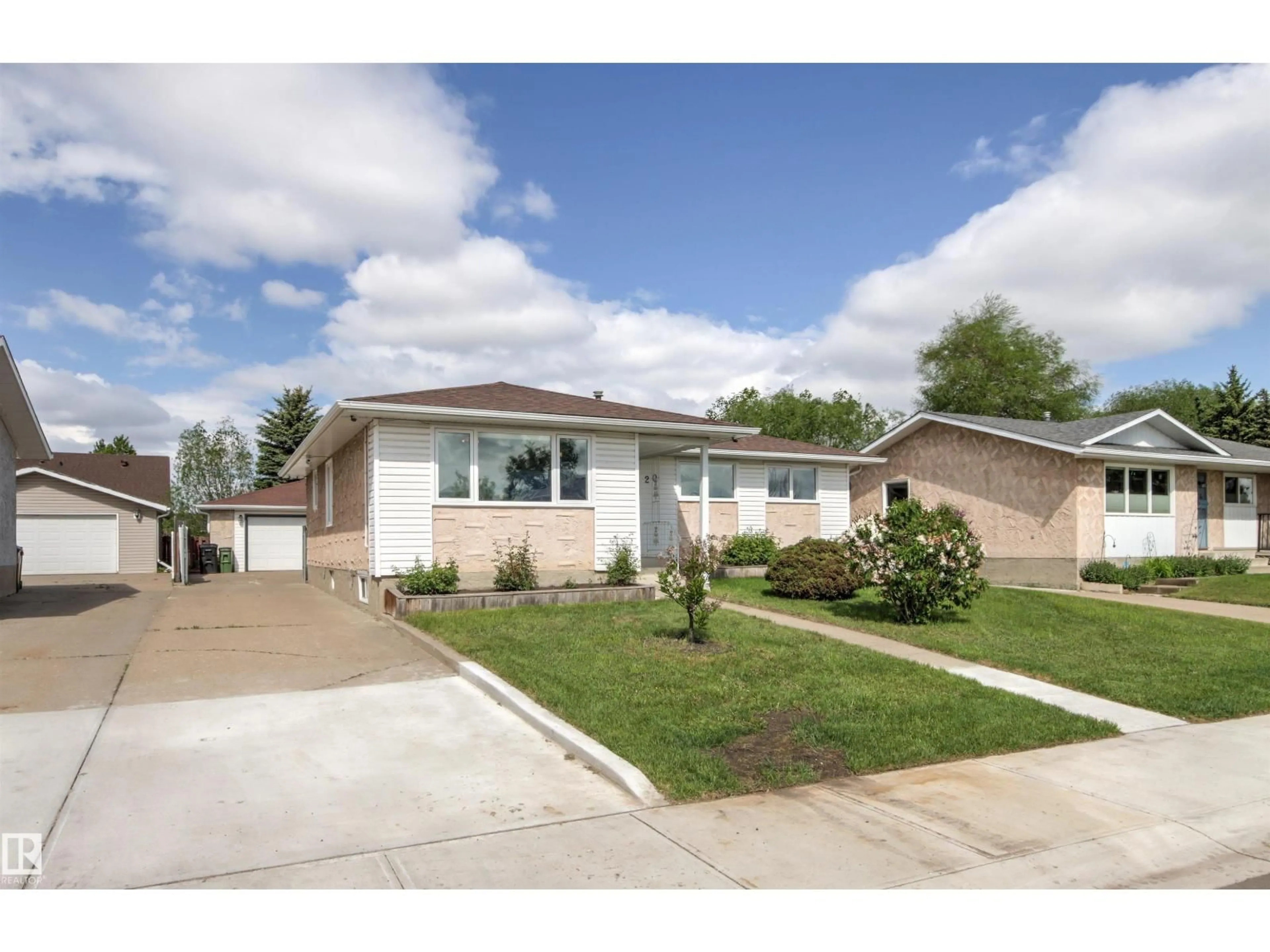 Home with vinyl exterior material, street for 20 HUGHES RD, Edmonton Alberta T5A4E2