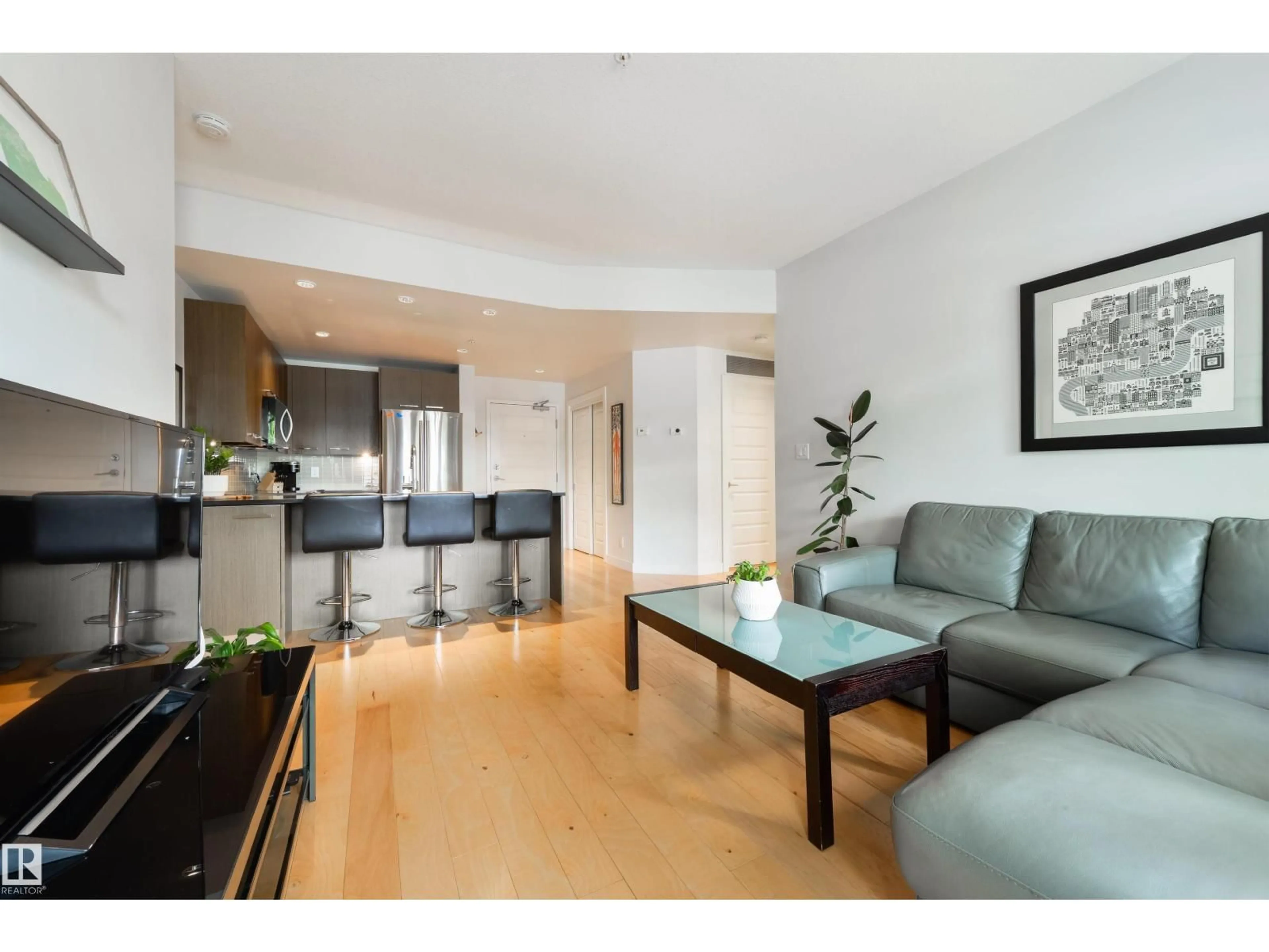 Living room with furniture, wood/laminate floor for 205 - 9908 84 AV, Edmonton Alberta T6E2G3
