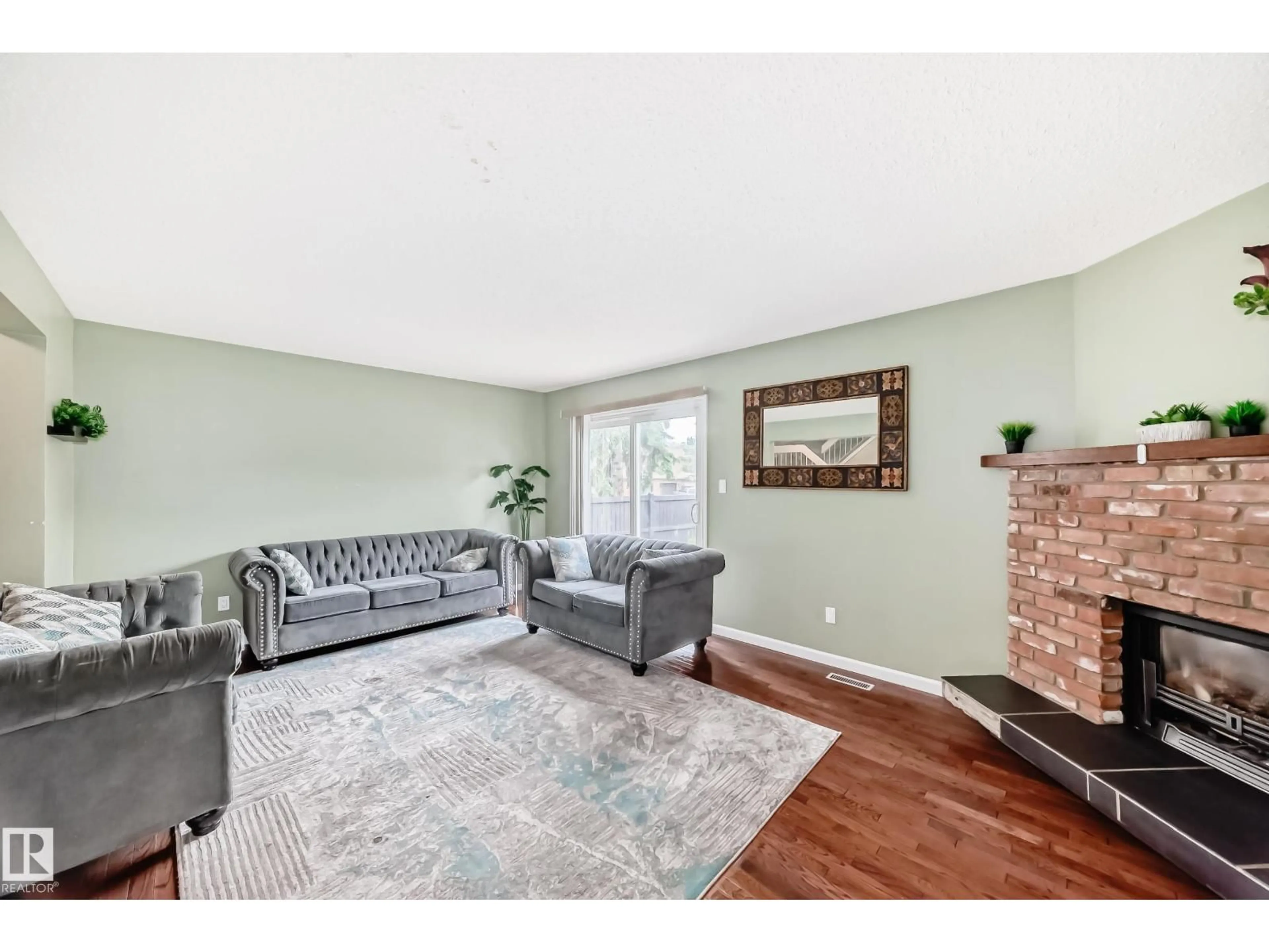 Living room with furniture, unknown for NW - 13621 28 ST, Edmonton Alberta T5A4B5