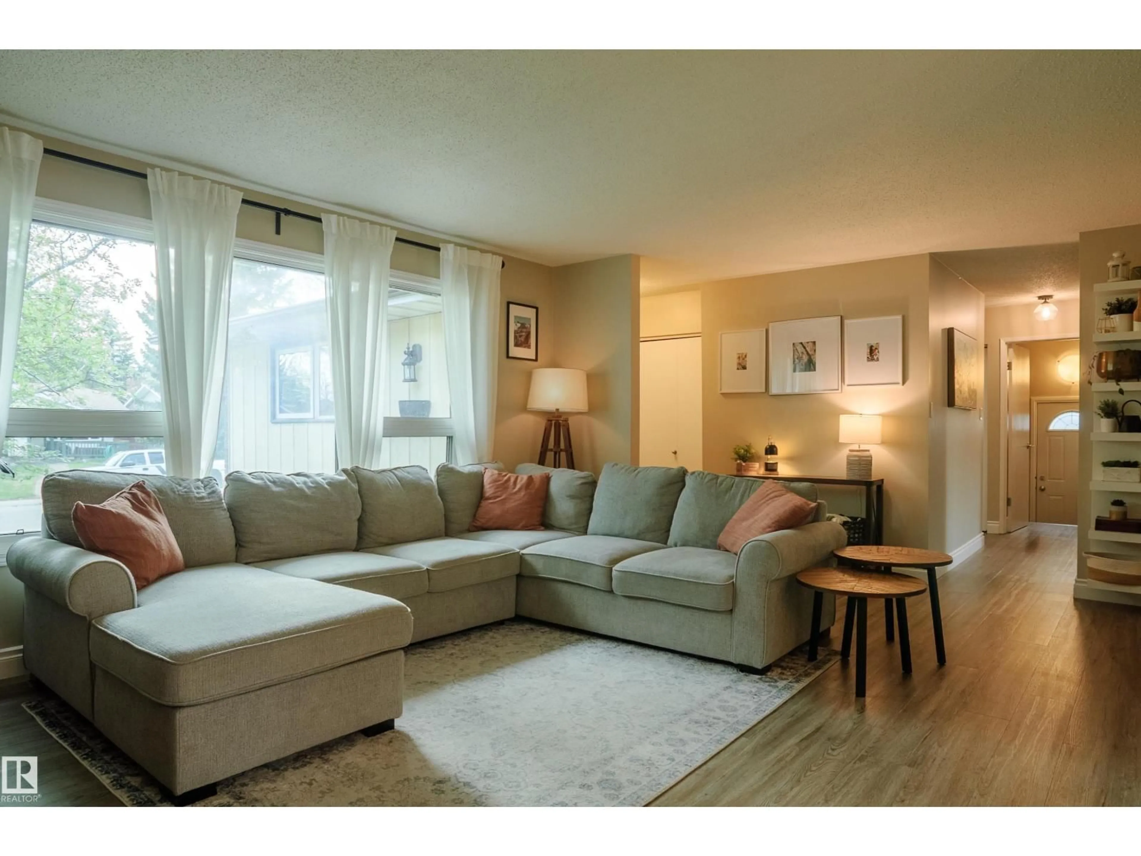 Living room with furniture, wood/laminate floor for 58 LODGEPOLE CR, St. Albert Alberta T8N2R7