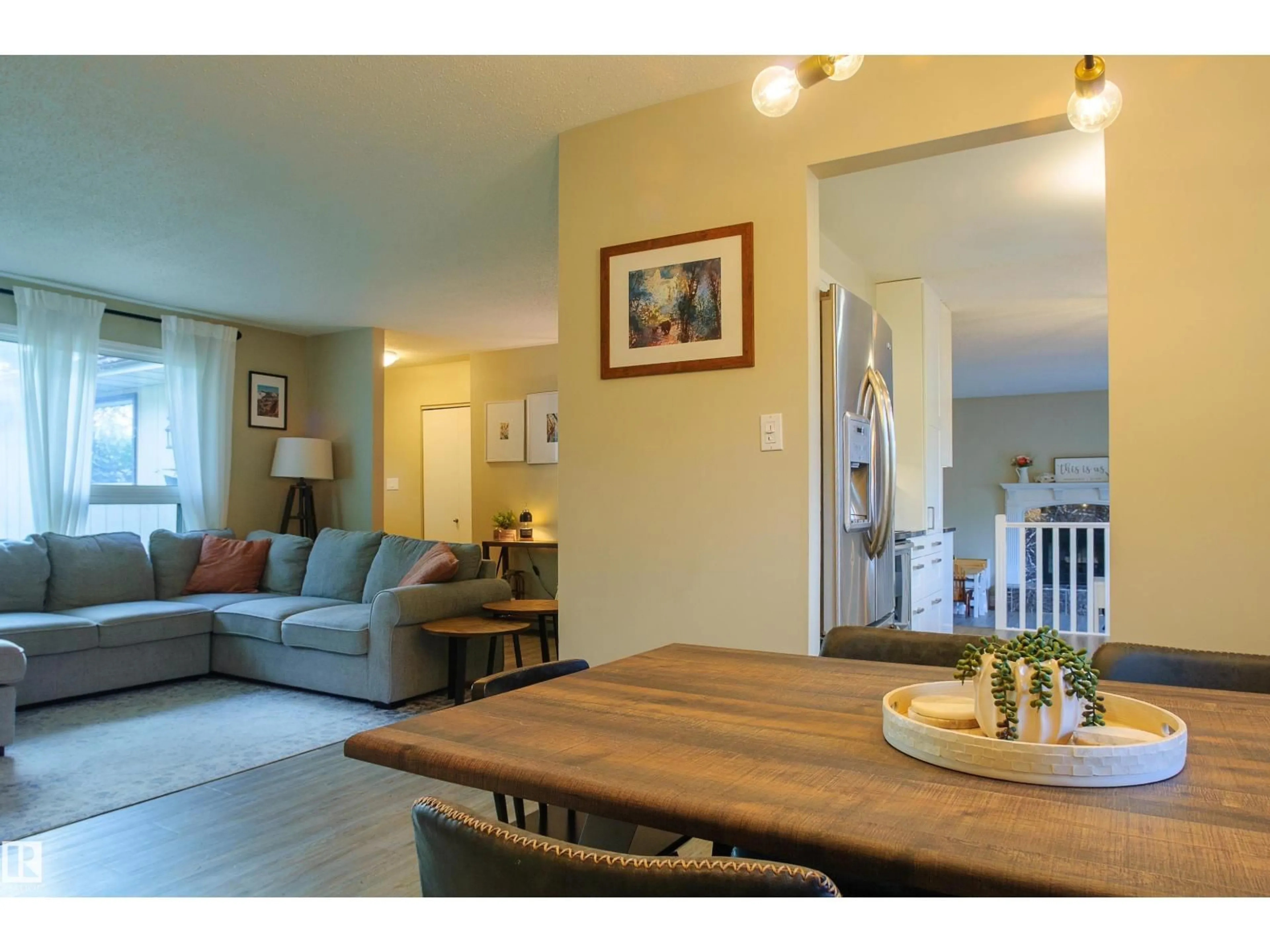 Living room with furniture, wood/laminate floor for 58 LODGEPOLE CR, St. Albert Alberta T8N2R7