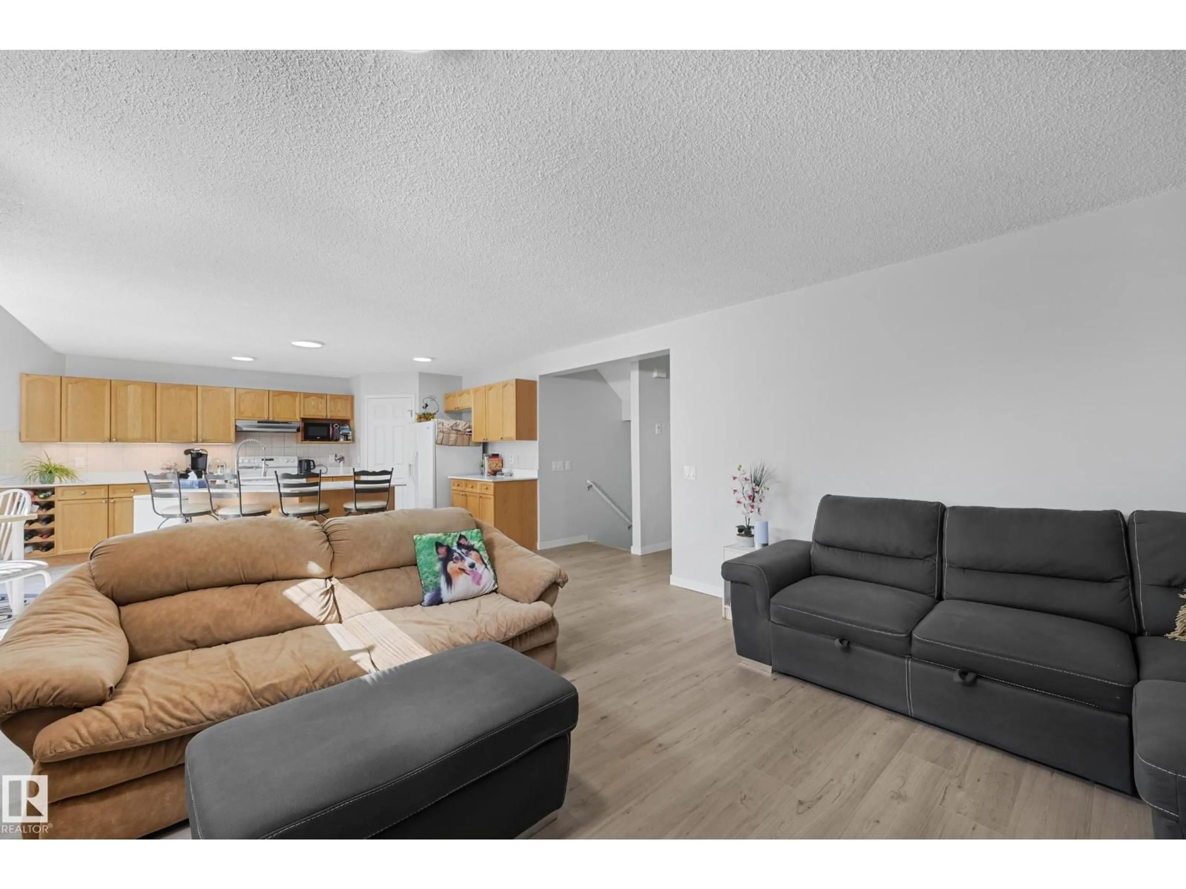 Living room with furniture, unknown for NW - 4960 191 ST, Edmonton Alberta T6M2T8