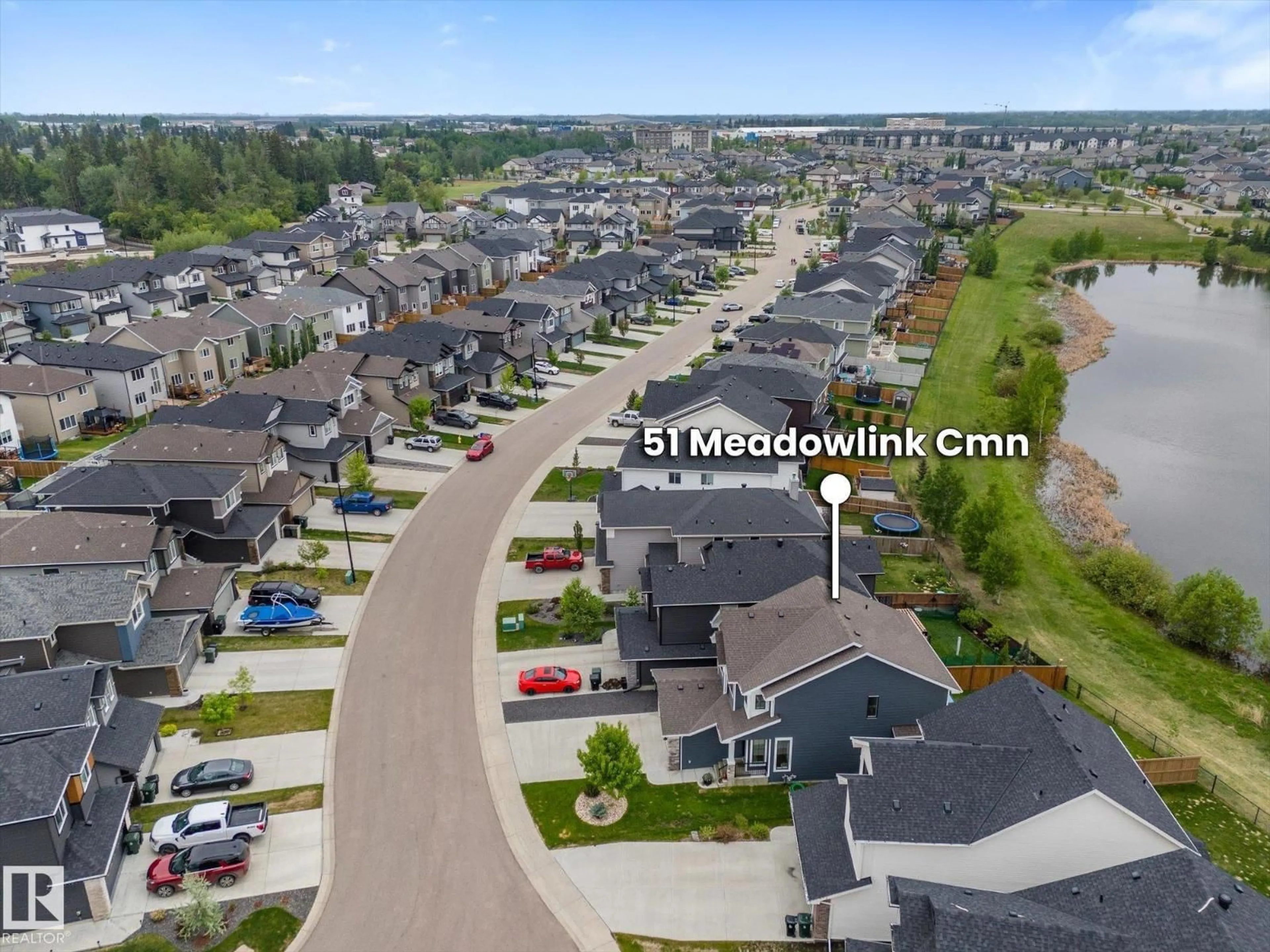 A pic from outside/outdoor area/front of a property/back of a property/a pic from drone, street for 51 MEADOWLINK CM, Spruce Grove Alberta T7X0P3
