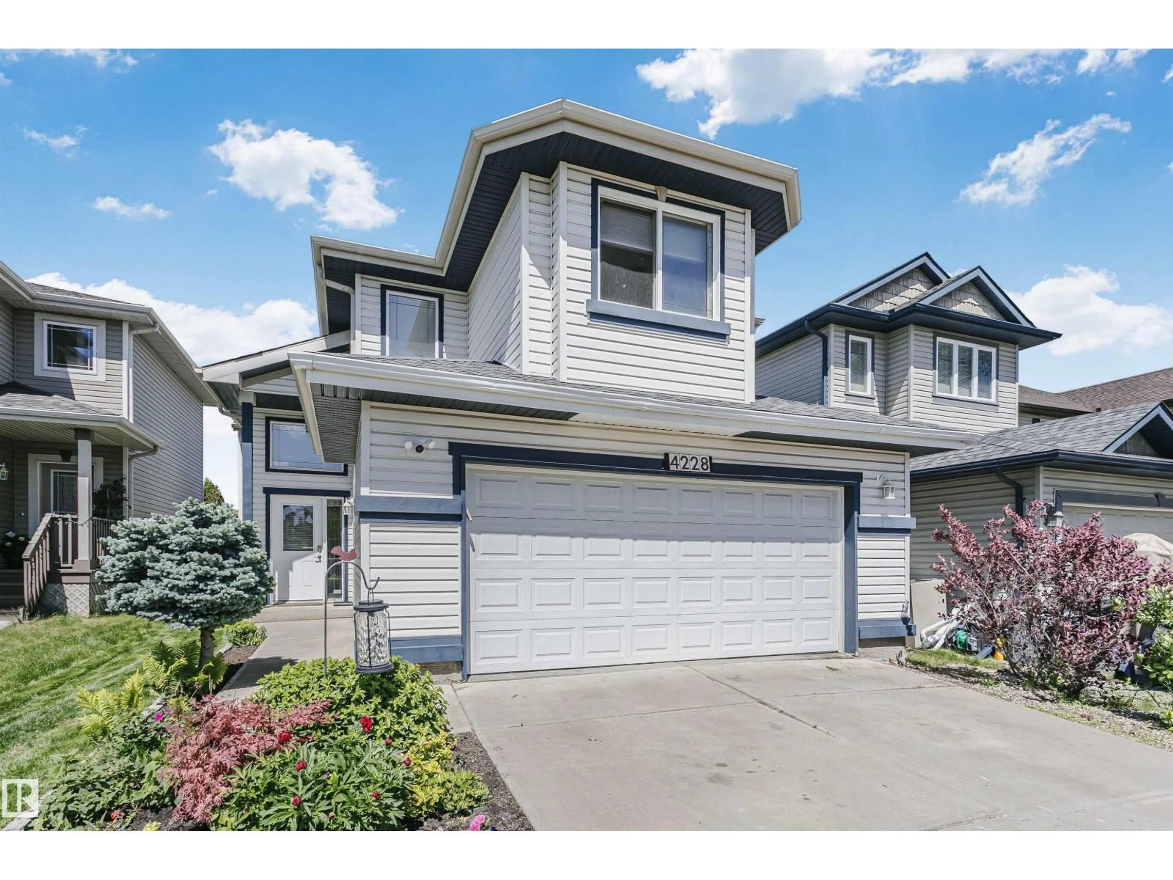 Home with vinyl exterior material, street for 4228 162 AV, Edmonton Alberta T5Y0H8