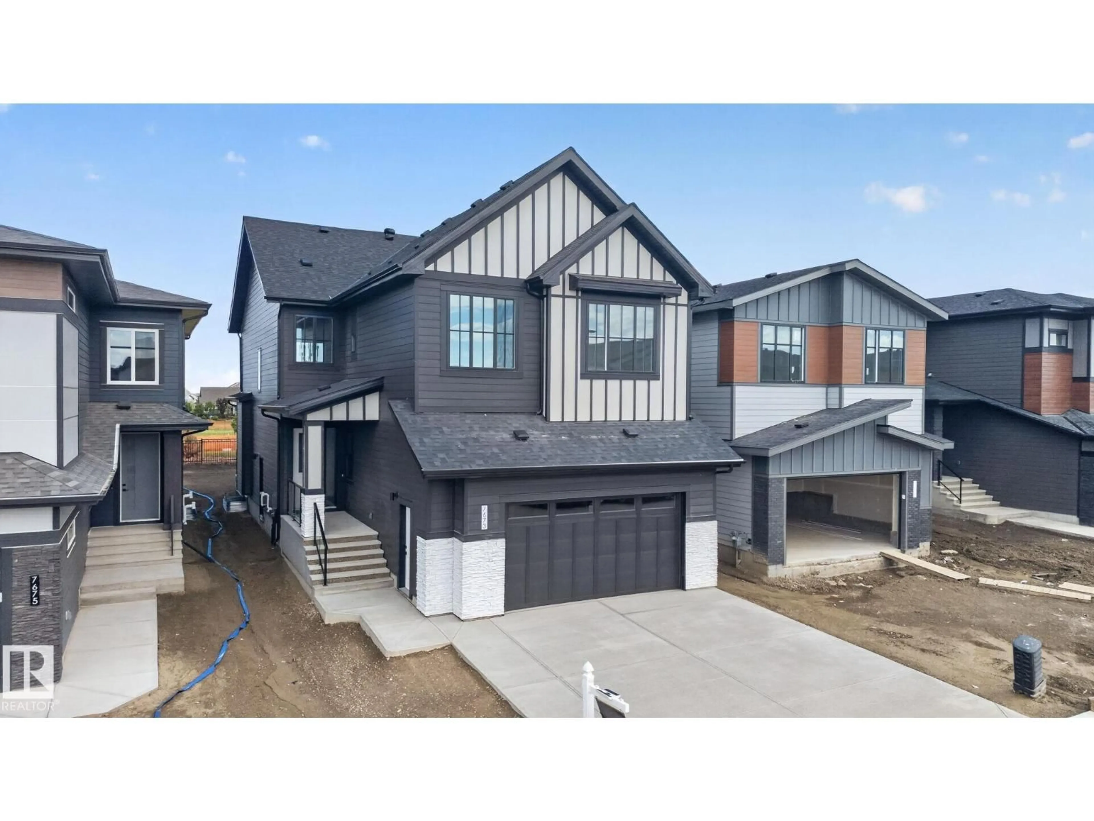 Home with vinyl exterior material, street for 7673 KIMIWAN CR, Edmonton Alberta T6W5W2