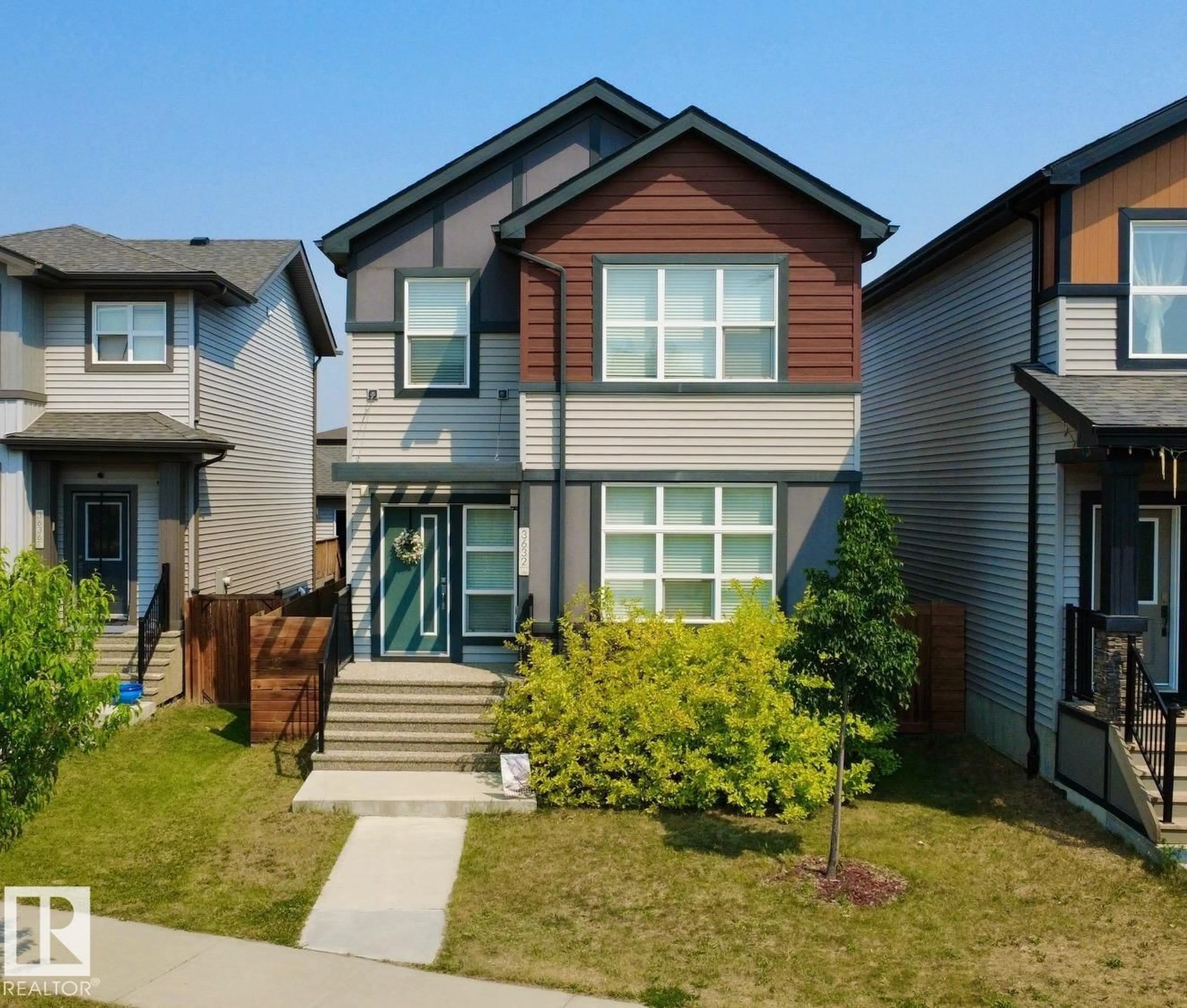Home with vinyl exterior material, street for 3632 8 AV, Edmonton Alberta T6X2G6
