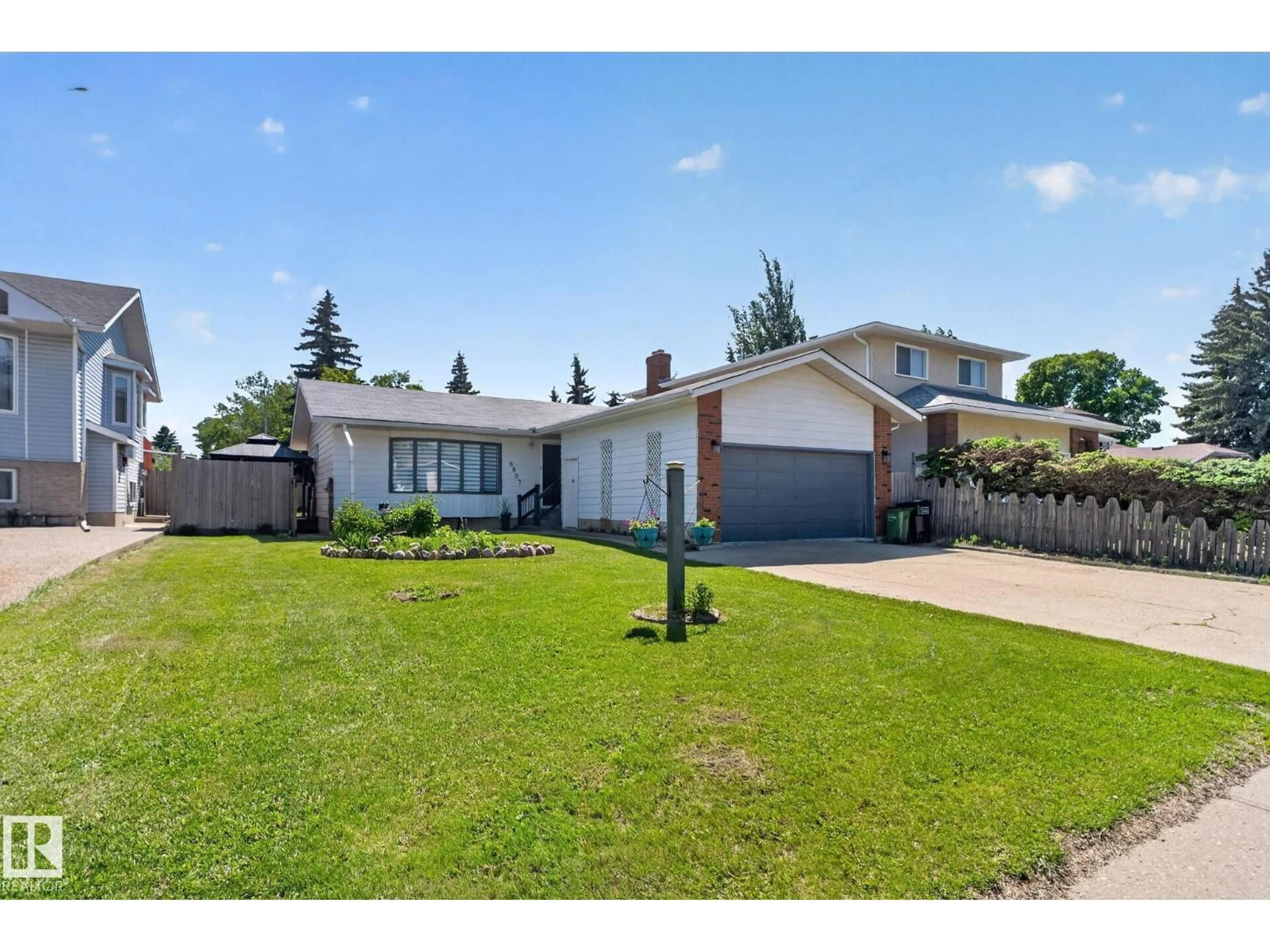 A pic from outside/outdoor area/front of a property/back of a property/a pic from drone, street for 8807 24 AV, Edmonton Alberta T6W2W3